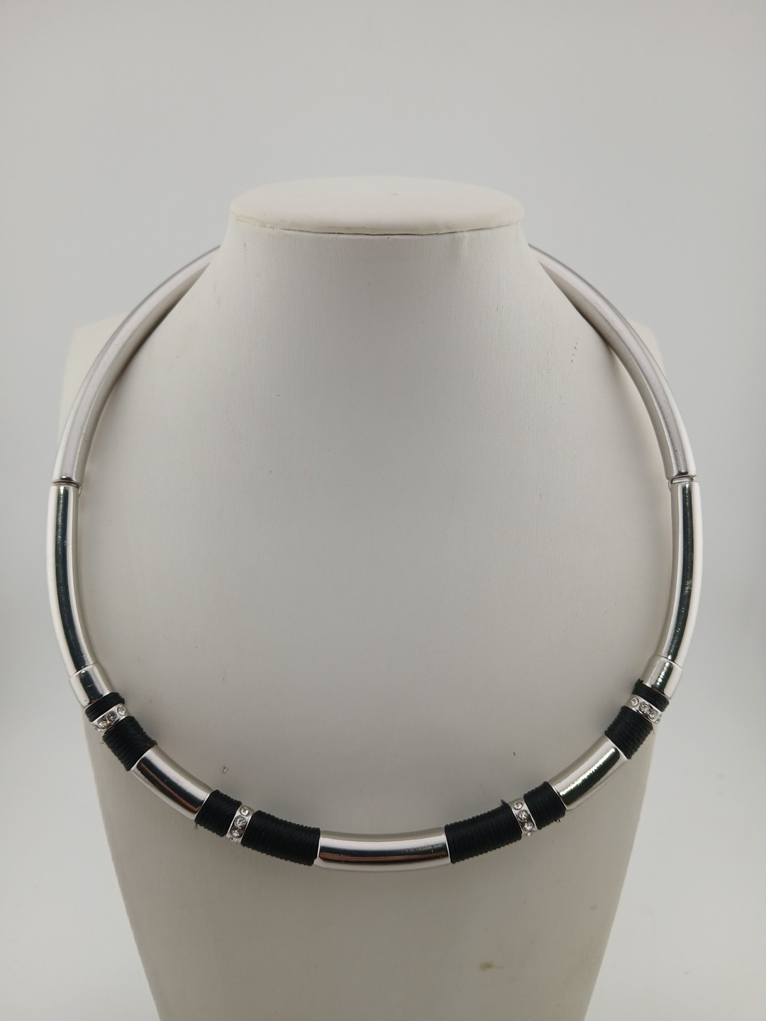 WHBM silver tone clear crystals black wrap accents tubular torque necklace