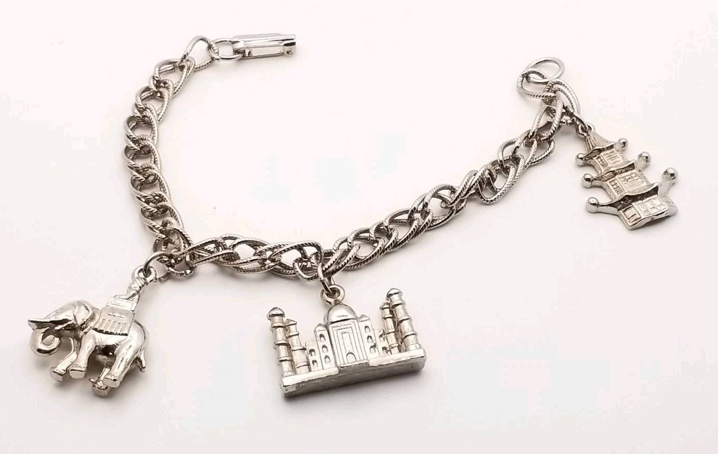 VTG Silver Tone Travel-Themed Charm Bracelet India Elephant Taj Mahal Pagoda 7″