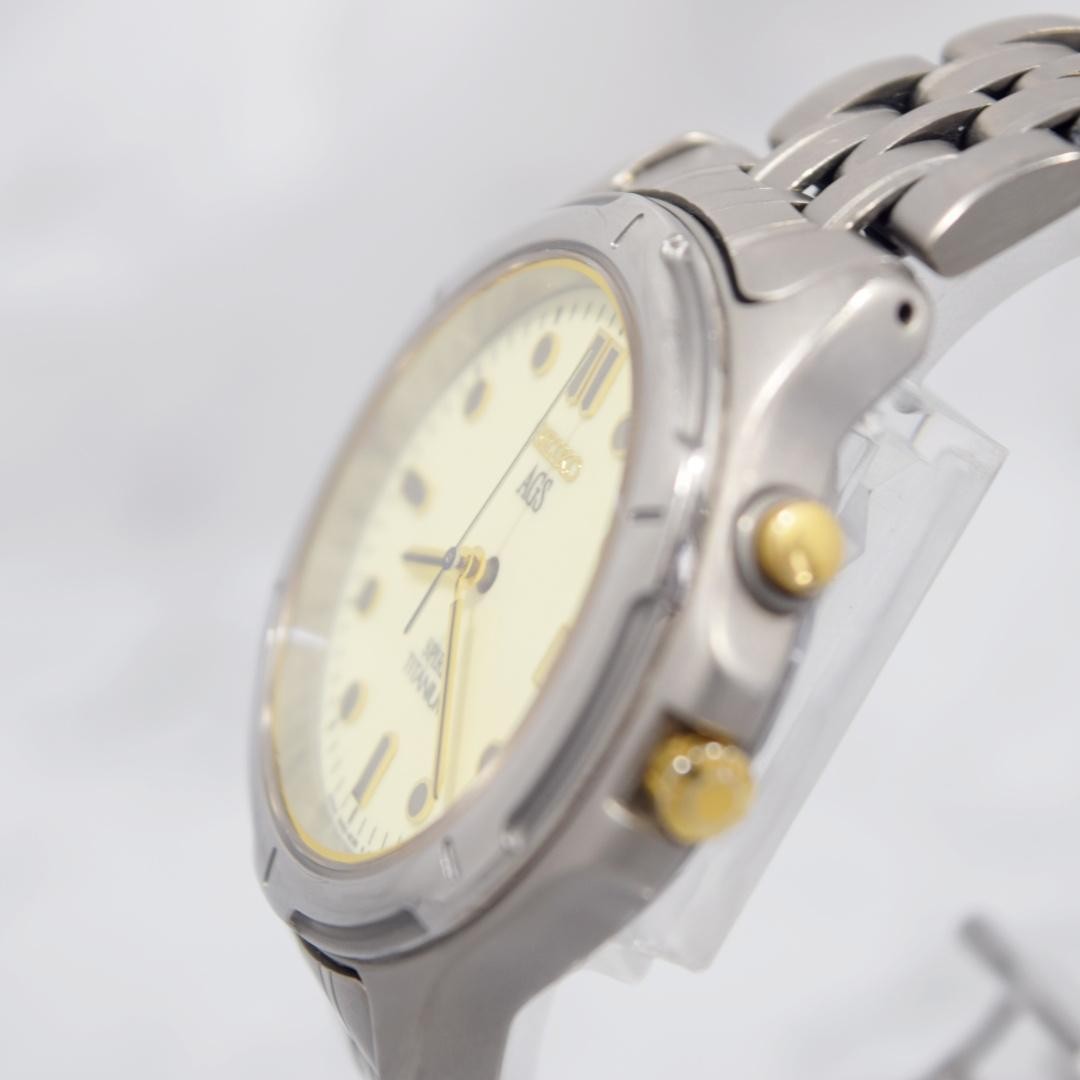 1996 SEIKO Spirit AGS Titanium watch with date display, non-functional.