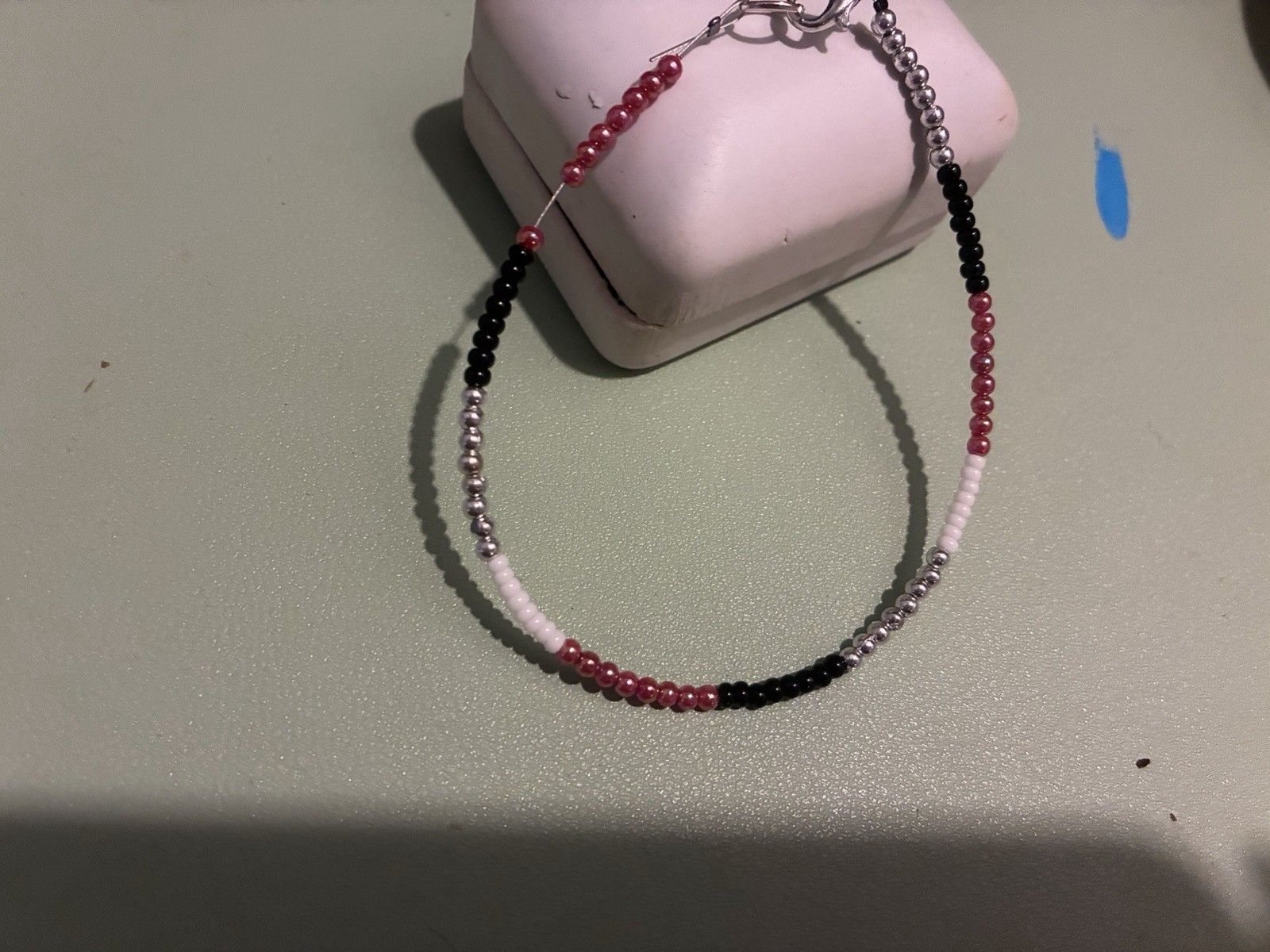 Multicolor Glass Beaded Bracelet with Lobster Clasp Closure.