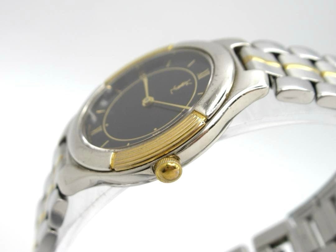 Yves Saint Laurent watch 4620-E66661Y, black dial, working condition.