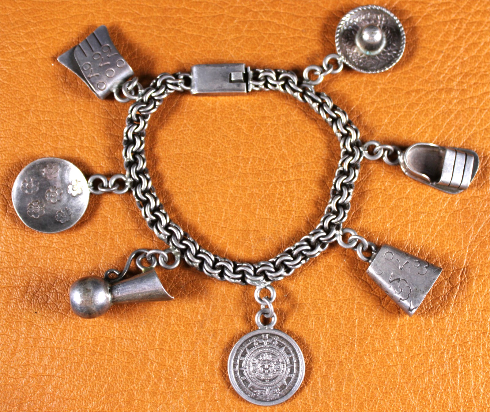 TAXCO ML-65 Souvenir Mexican Theme Charm Bracelet 7 Charms Sterling Silver Sz 6″