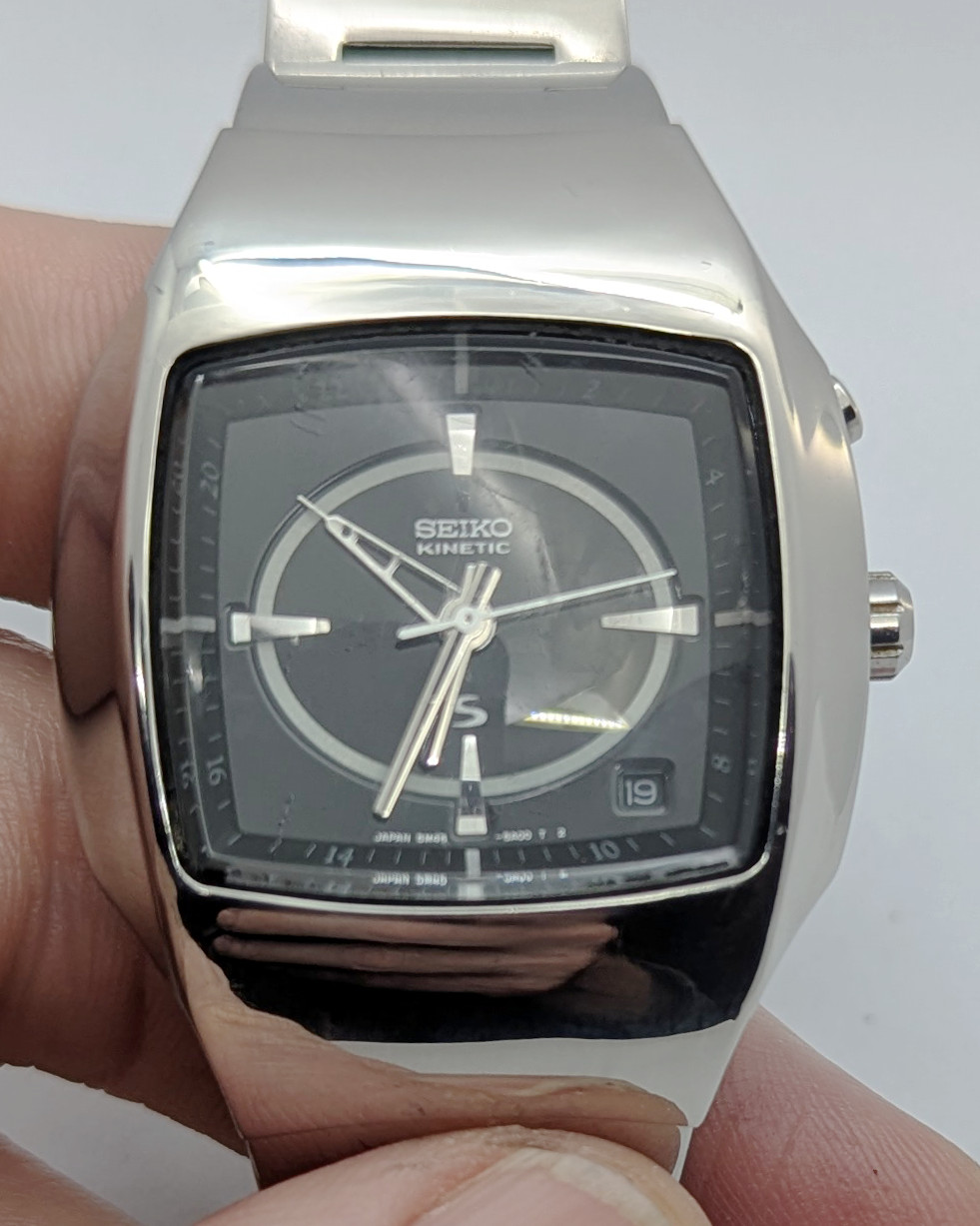 Seiko Kinetic 5M45 R-SUS GMT Black Dial Integrated Bracelet | New Capacitor