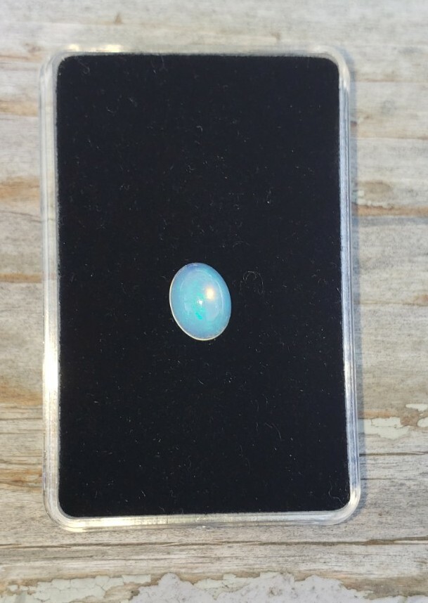 Ethiopian Crystal Nice Play-Of-Color 1.40Ct. Fire Opal Oval Cabachon Solitaire!
