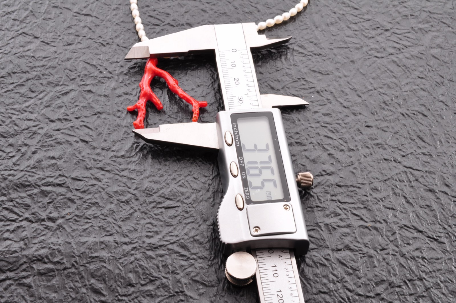 Sterling silver clasp, red coral and pearl pendant (total 54.0ct) Certification.