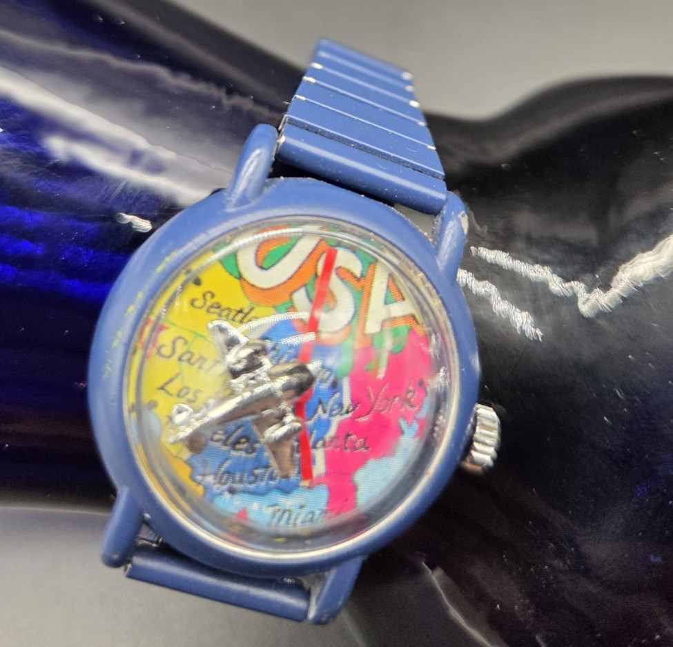 VTG Watch Bubble Dome Rotating Plane USA Map Blue wind-up Out of Time