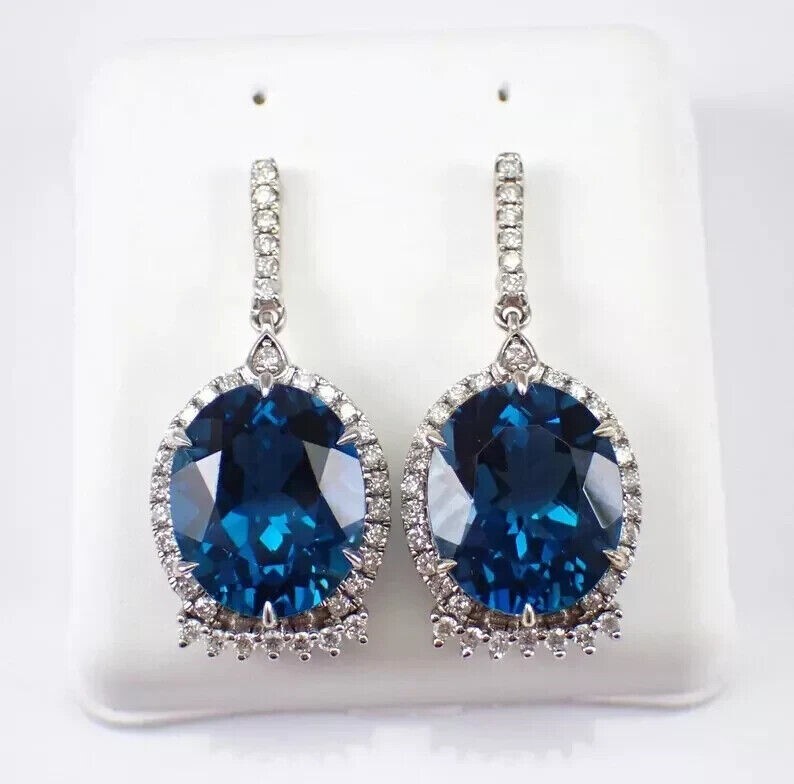 Oval Cut Simulated London Blue Topaz Halo Drop Earrings In 14k White Gold Plated