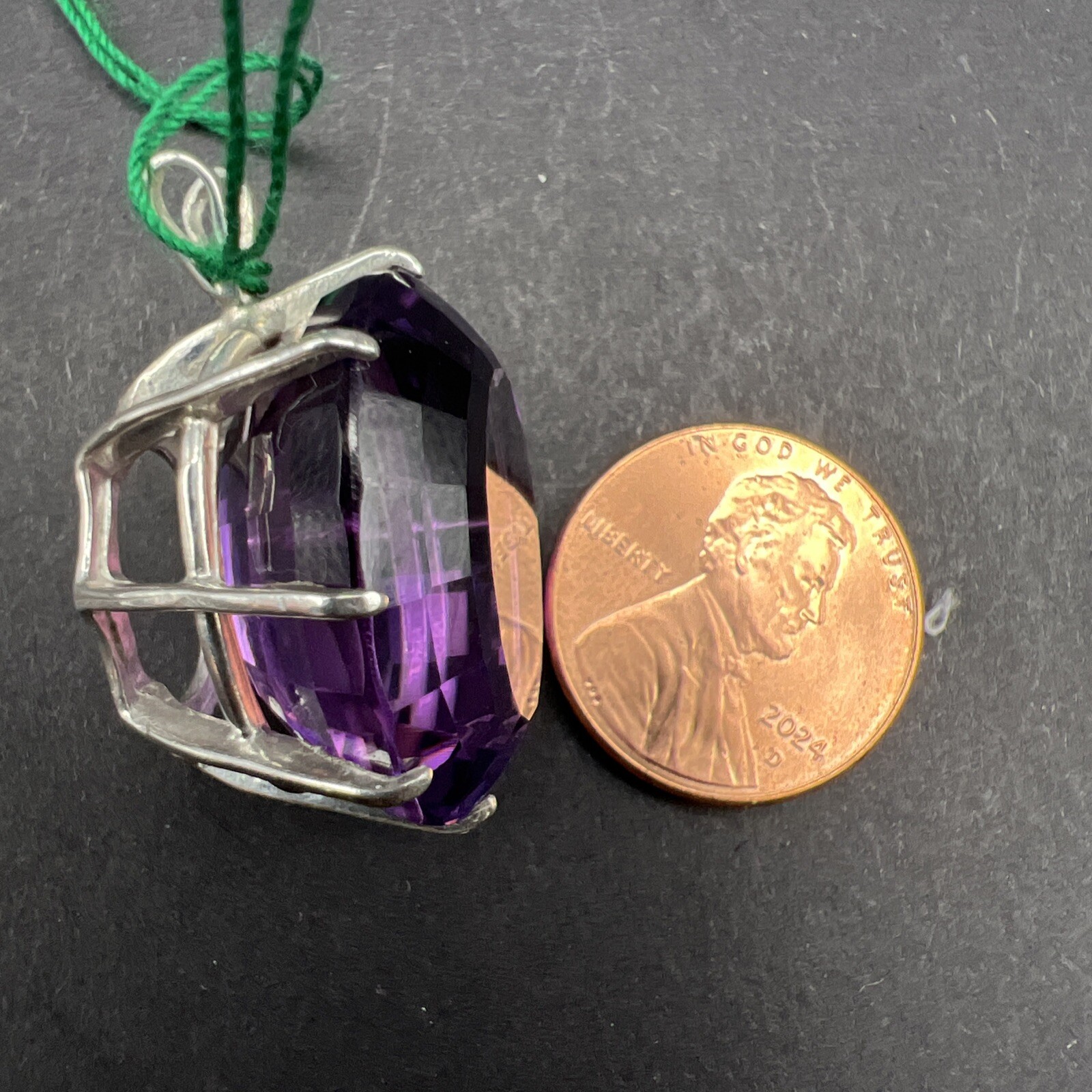 31.69 ct Amethyst and Sterling Silver Pendant. 8.8 Grams
