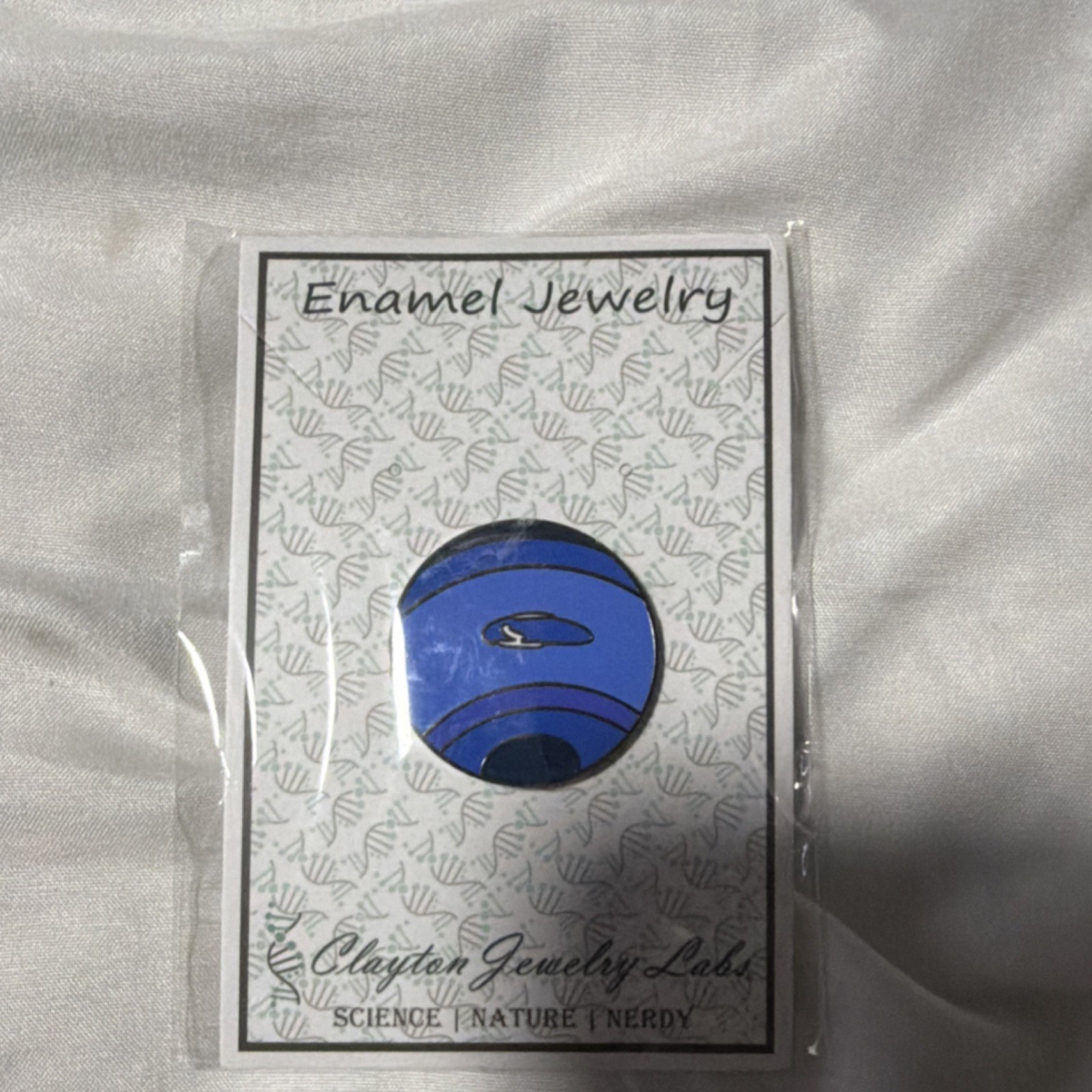 Clayton Jewelry Labs Blue/Black Enamel Circle Pin, Science & Nature Theme
