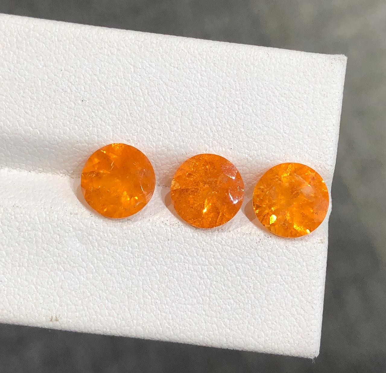 7.69 carat Natural Spessartite Garnet for earrings with Round shape from Africa
