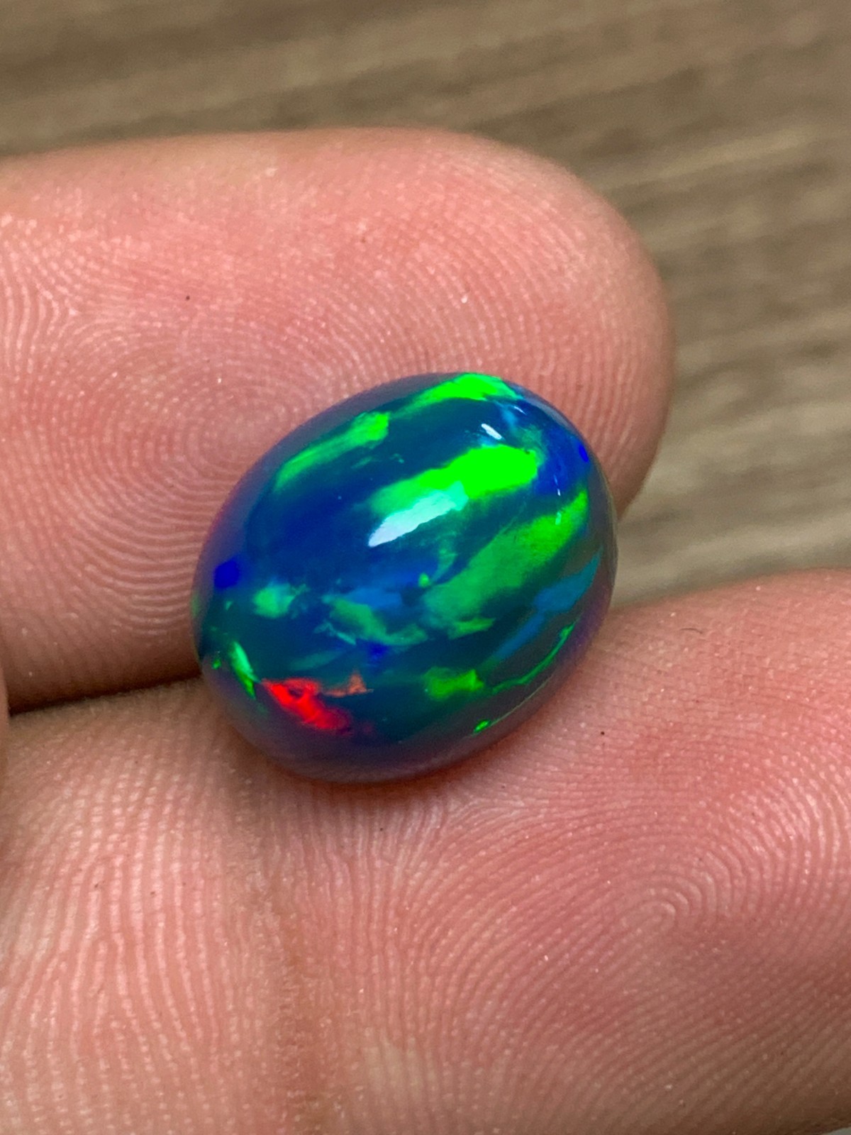 Ethiopian Opal Gemstone 6.35crt Black Oval Cabochon Rainbow Flash Welo Loose Gem