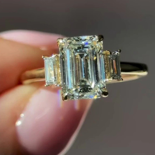 3.7CTW Emerald Cut Moissanite Three Stone Engagement Ring 14K Yellow Gold Plated