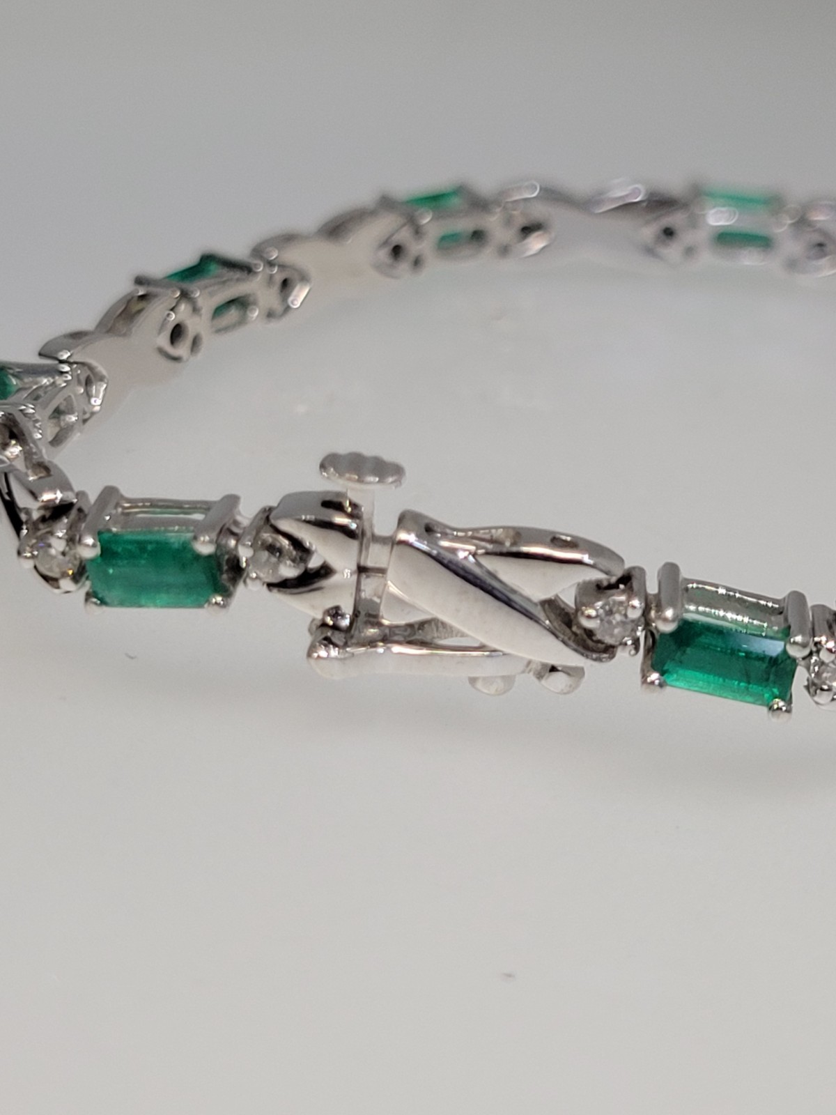 18k White Gold 3.3 cttw Gorgeous Emeralds and .63 cttw Diamond Bracelet