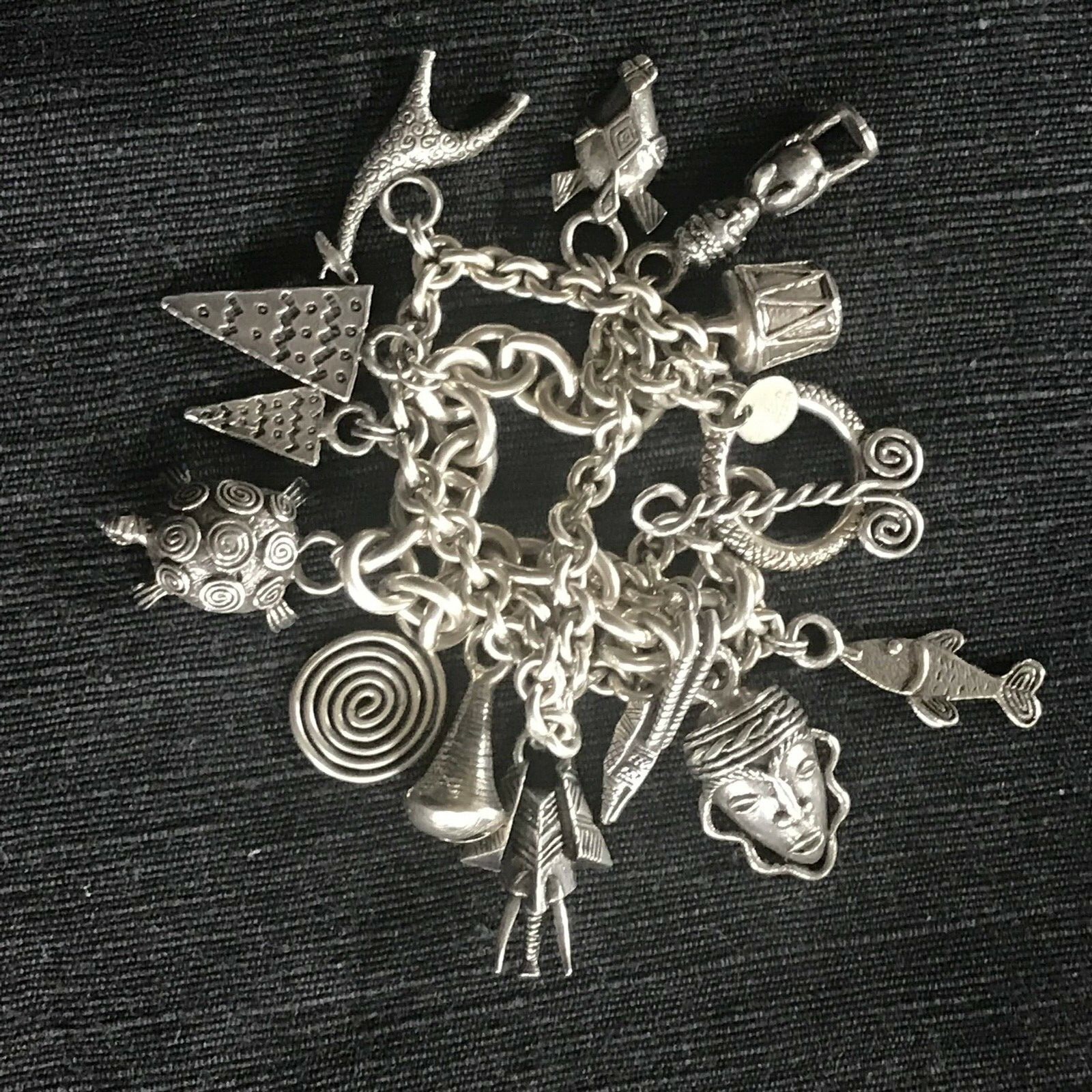 SUSAN CUMMINGS. SS 3 ROW HEAVY LINK BRACELET. 170 GRAMS. ENDANGERED SPECIES