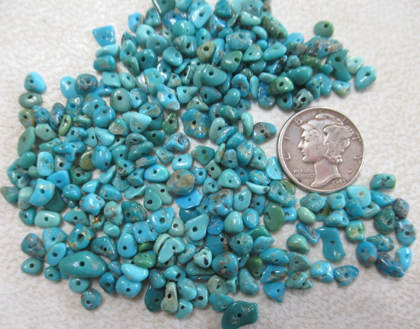 KINGMAN TURQUOISE DRILLED NUGGETS 1/2 OZ 3 X 2mm to 7 X 4mm STABILIZED #787