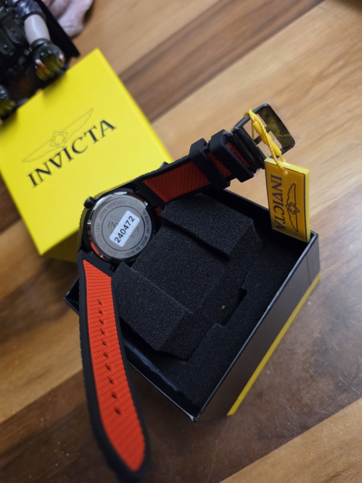Invicta Men’s Sport Quartz Analog 50mm 50m Black/Red Dial Orange Strap Box