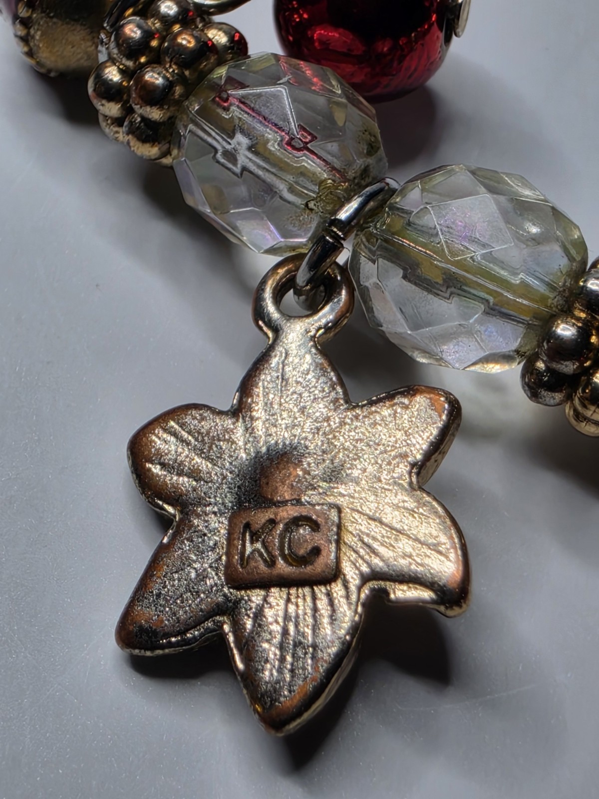 KENNETH COLE Christmas Poinsettia Charm Bracelet Enamel & Crystals Stretch