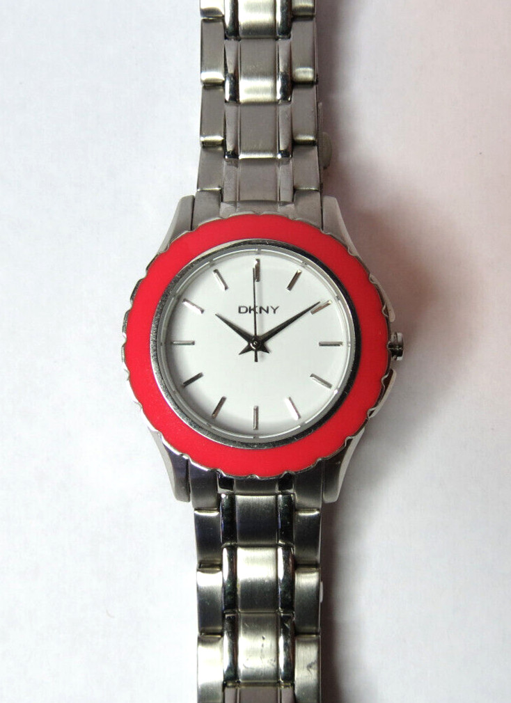 NICE WOMENS DKNY QUARTZ SPORT 5 ATM PINK BEZEL WATCH FRESH BATTERY RUN’S,