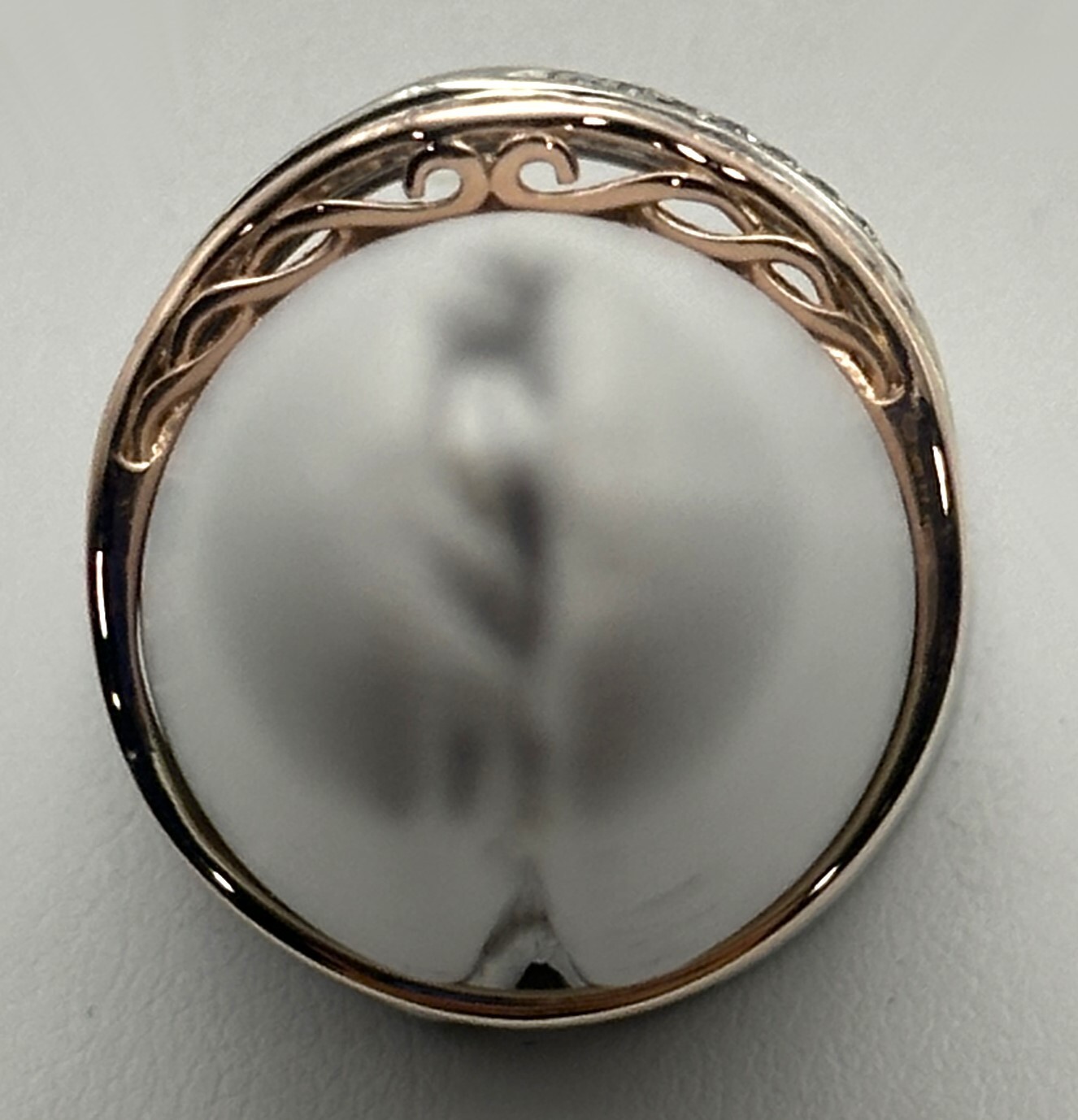 14k Two Toned Rose / White Gold Ring with 0.20cts of Diamonds Size: 8.25