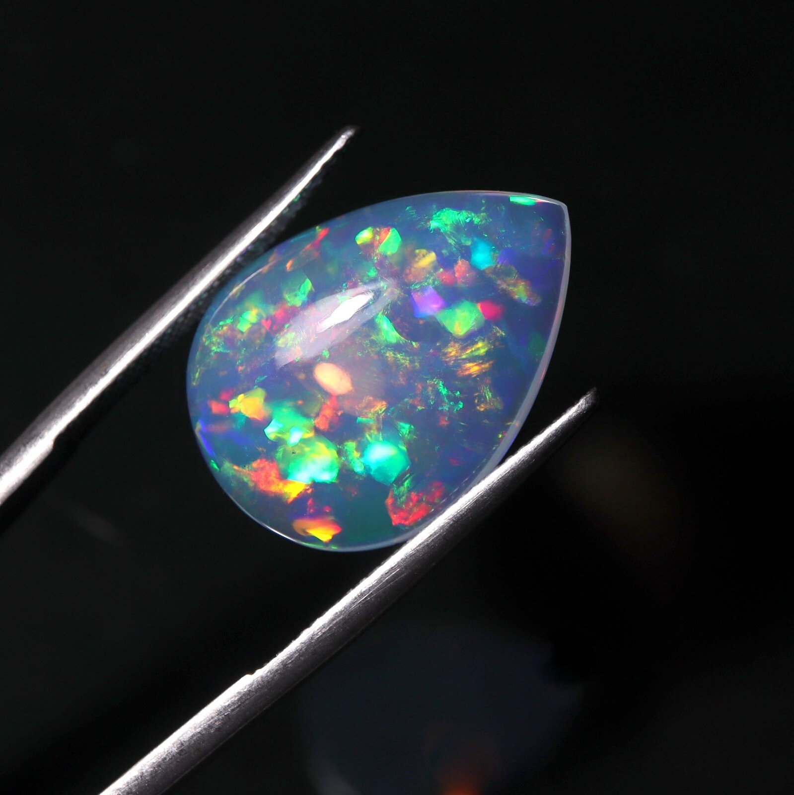 9 Carat 21.9×15.9 MM Natural AAAA Rainbow Fire Ethiopian Welo Opal Pear Shape