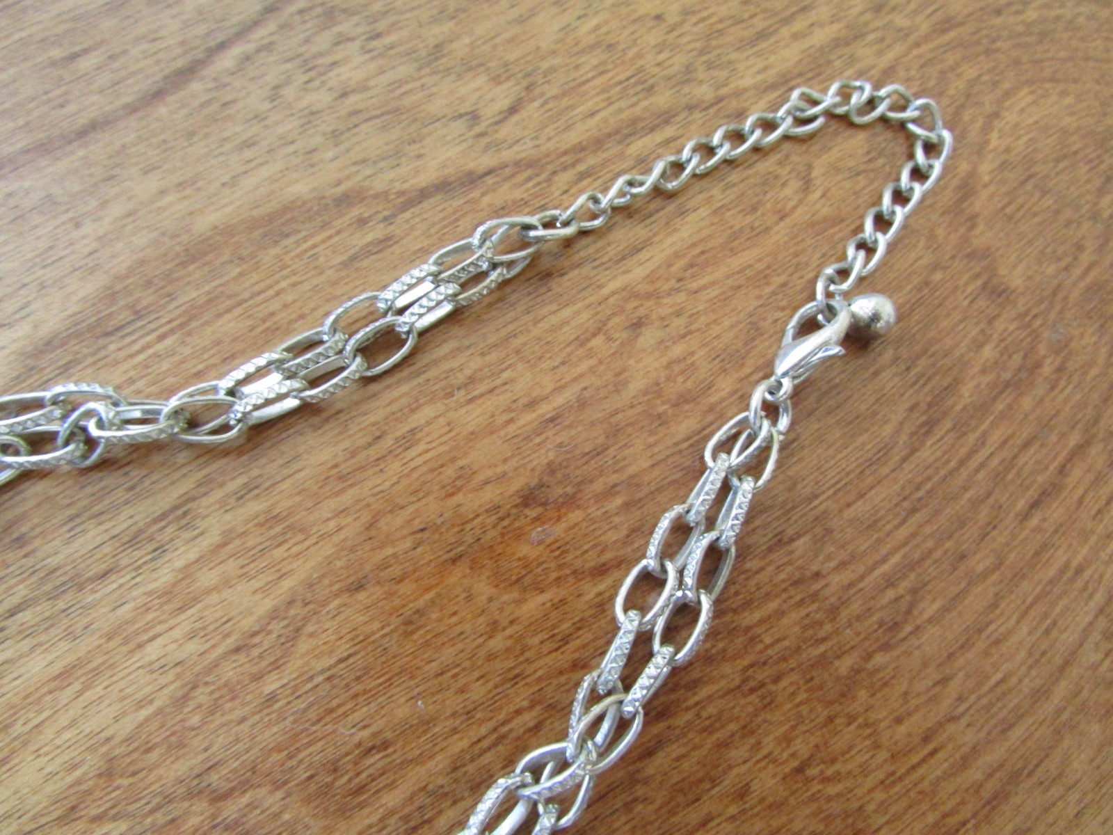 SILVER TONED WIRE LINK COIL AND CHAIN NECKLACE