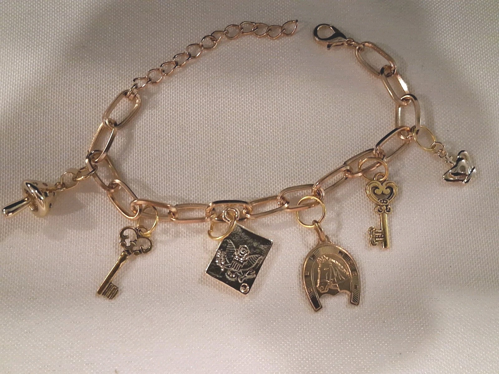 Goldtone Dangle Charm Bracelet, 6 Charms:Horse,Crown,Keys,Mushroom& Amer. Eagle