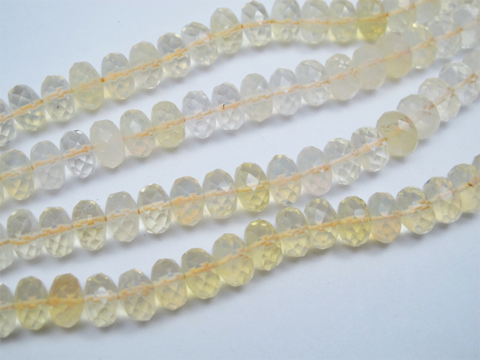Pineapple quartz faceted roundell beads. 8mm,10mm Light yellow quartz beads.
