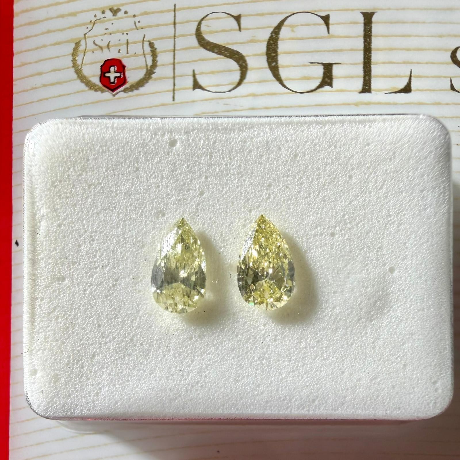 Natural Fancy Yellow Diamond Pair 0.36ct Pear VVS1 SGL Certified 5*3mm