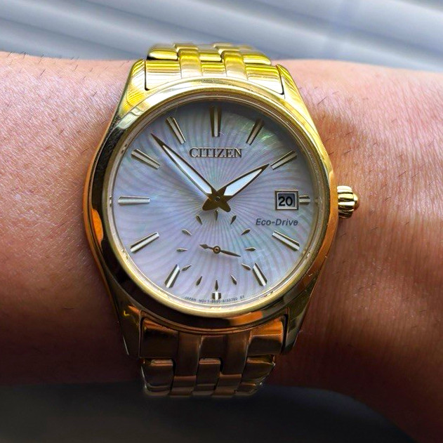 Citizen Eco-Drive Women’s Gold Tone Bracelet Watch White Dial Date Analog