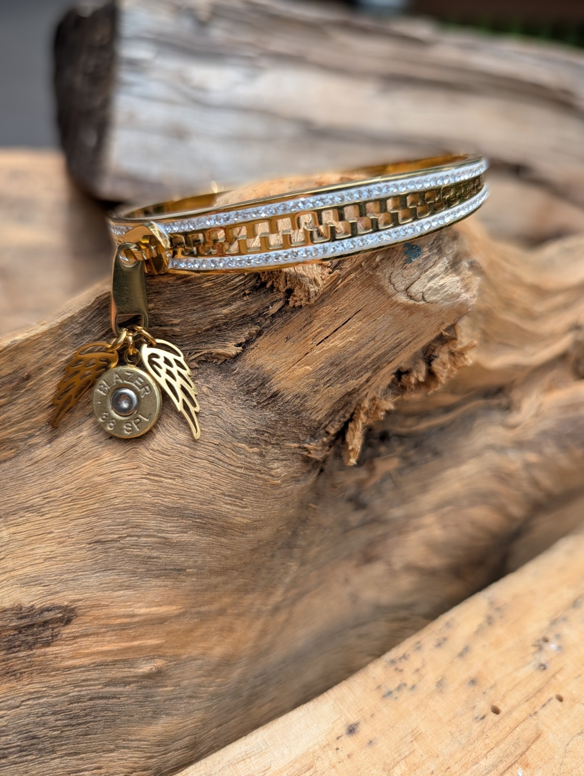 Silver or Gold Stainless Zipper wing and Bullet Bracelet. Optional Glass Crystal