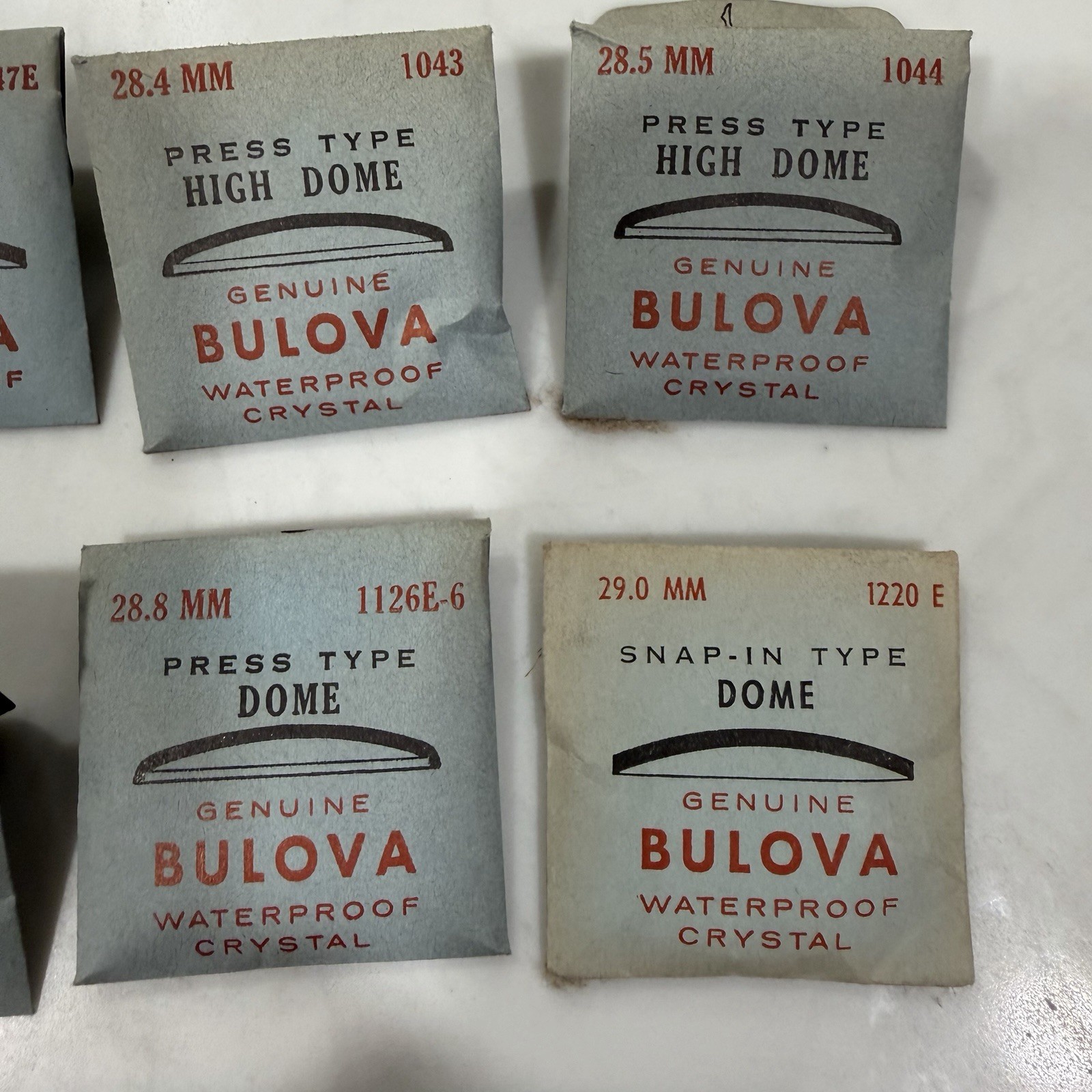 Lot Of 11 Genuine BULOVA Dome Type Watch Crystals 26.1-31.6mm NEW OLD STOCK!