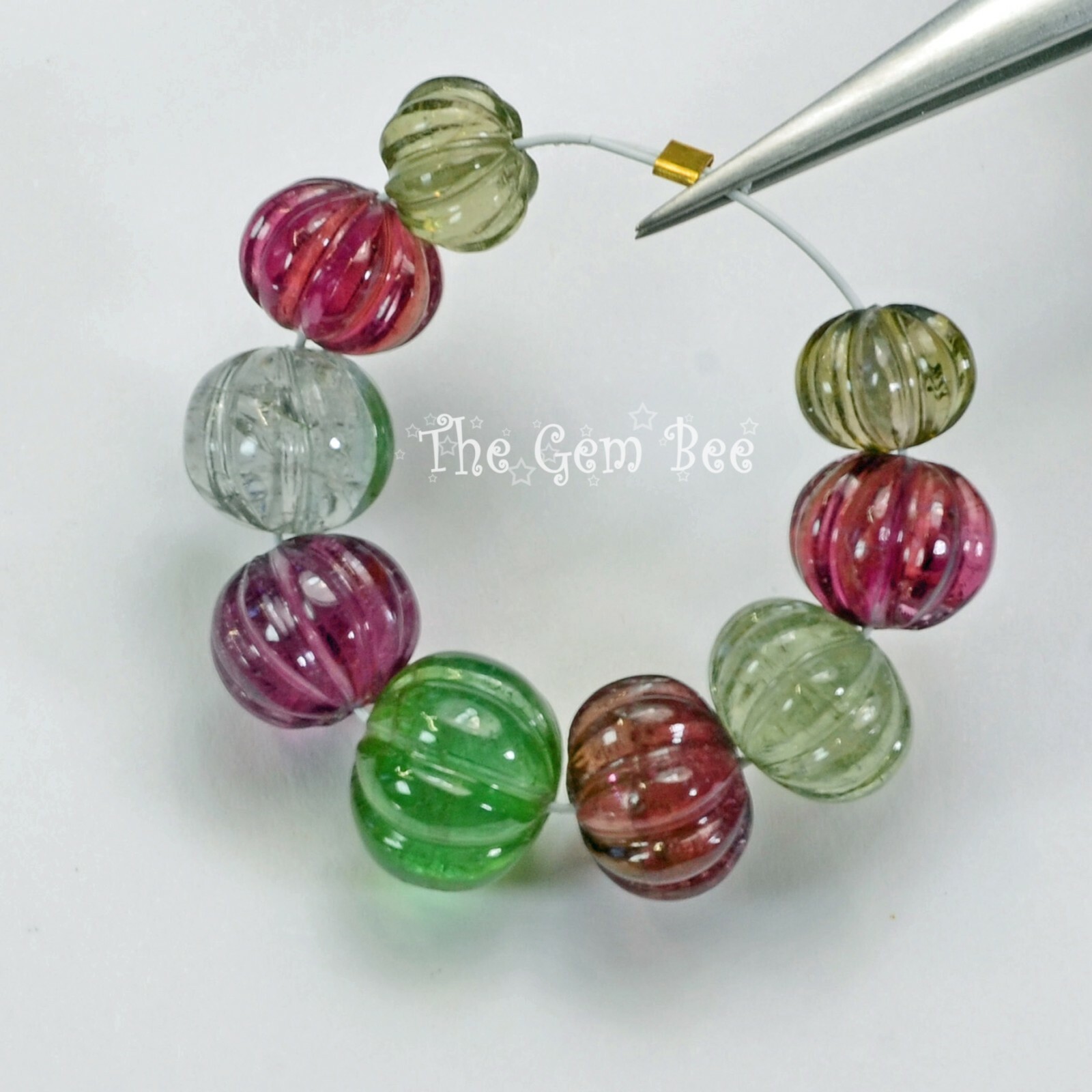7.6mm-10.8mm Fine Candy Tourmaline Carved Melon Fluted Bead 2.6″ Strand (9)