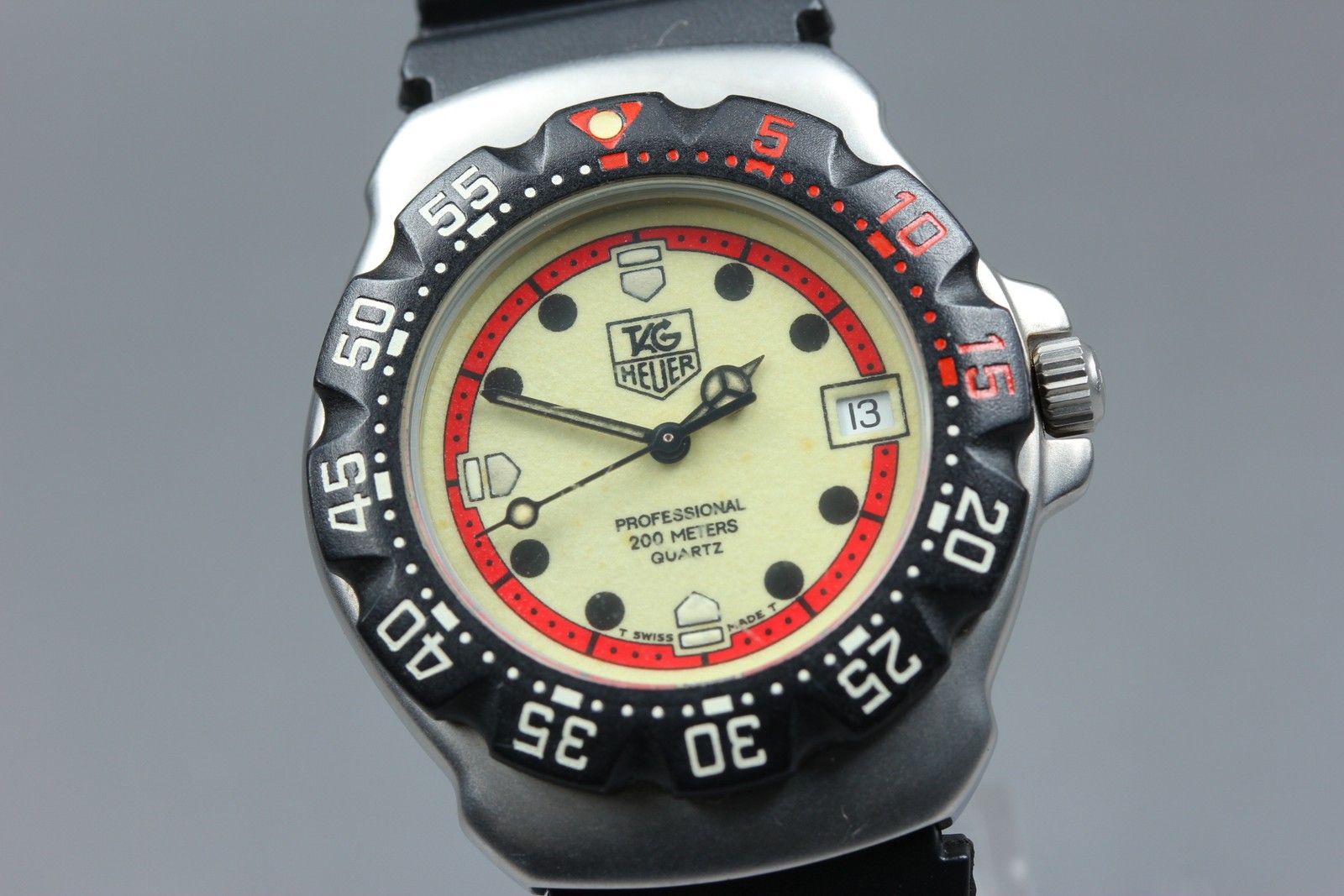 TAG Heuer Formula 1 Professional WA1211 34mm Cream Dial Date Quartz Men’s Watch