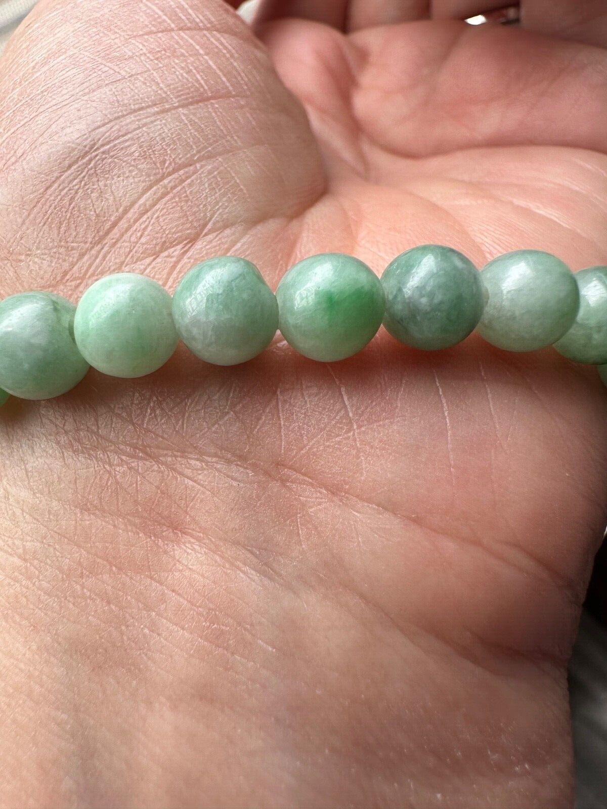 WRIST 6.7IN, STONESIZE 7MM NATURAL PEA GREEN COLOR JADEITE JADE BEADED BRACELET