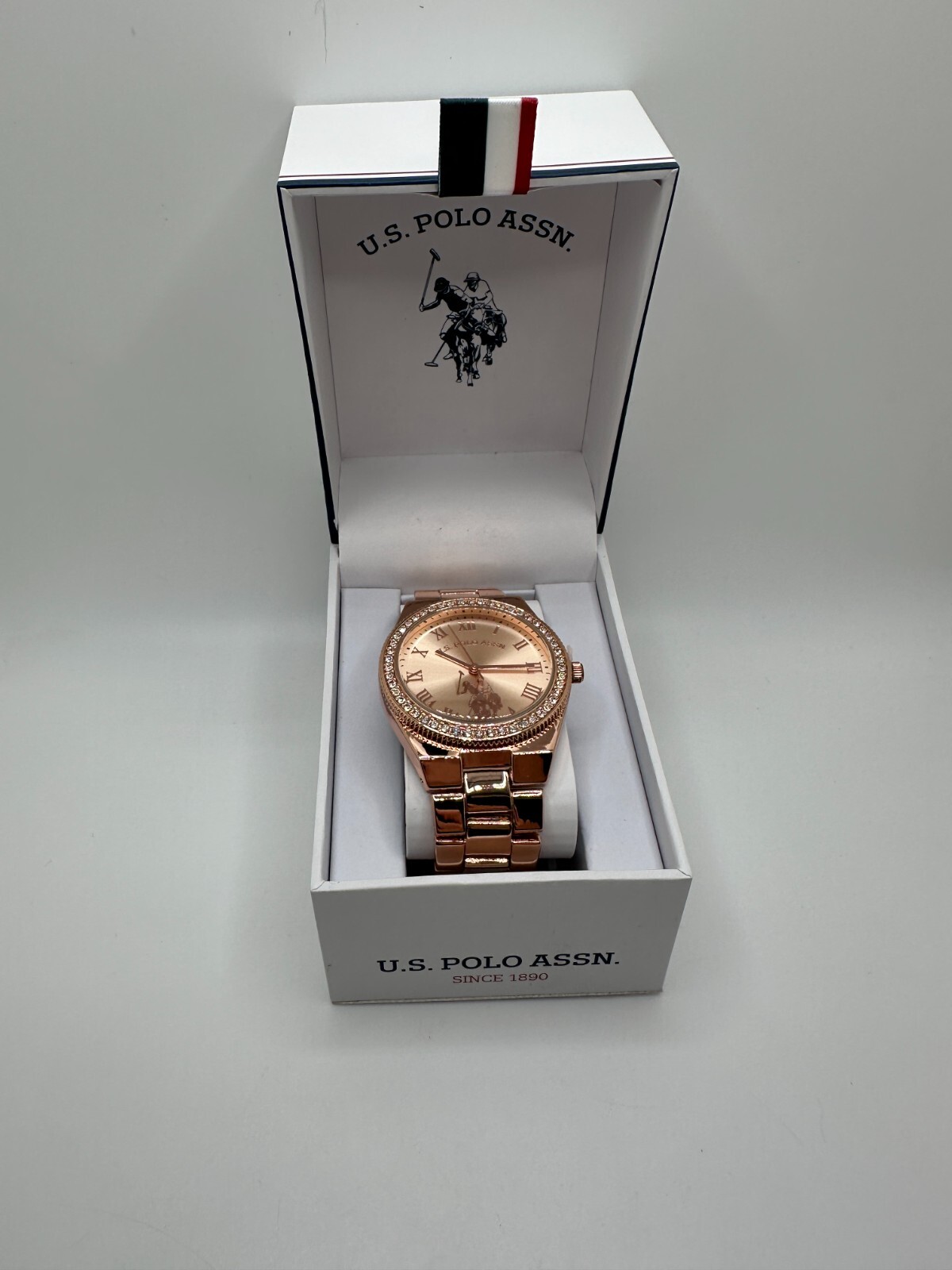 U.S. Polo Assn. Womens Rose Gold Tone Analog Display Round Wristwatch