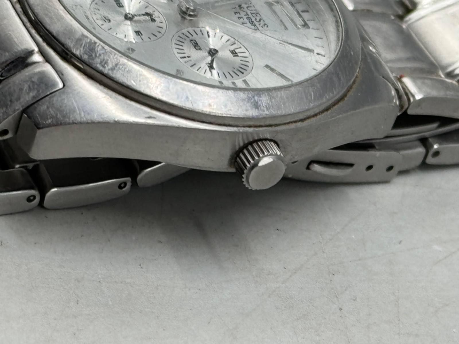 guess steel men’s watch 50 meters 165 feet water resistant made in Japan READ
