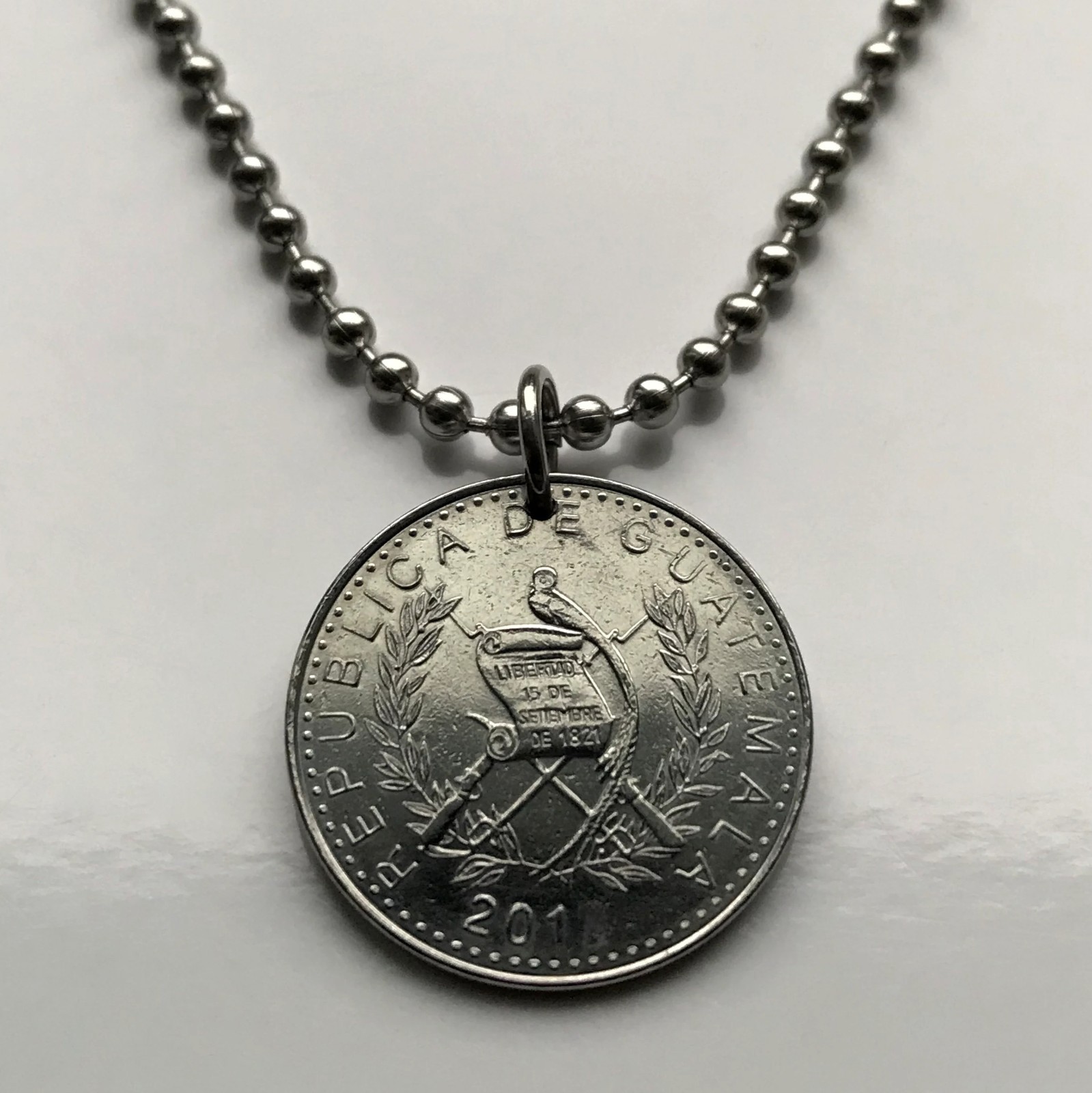 2014 Guatemala 10 coin pendant Resplendent Quetzal bird Mixco Villa Nueva 003538