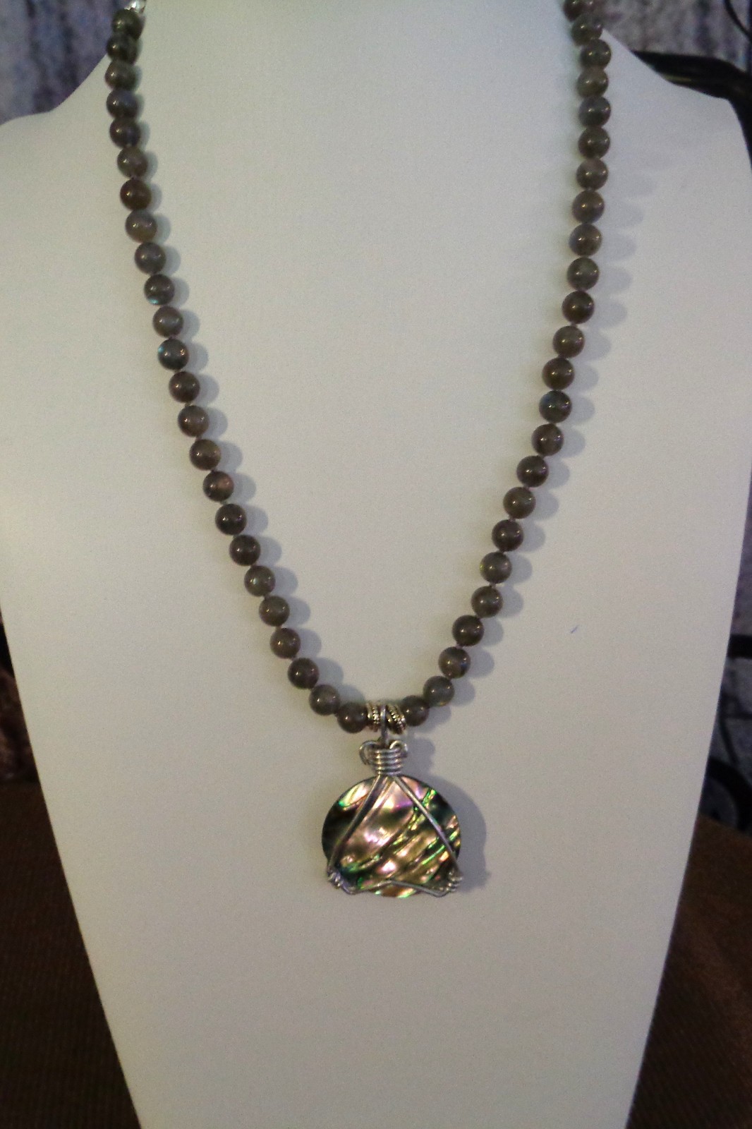 Artisan crafted, gorgeous, aluminum wrapped Paua pendant, on 19” Labradorite str