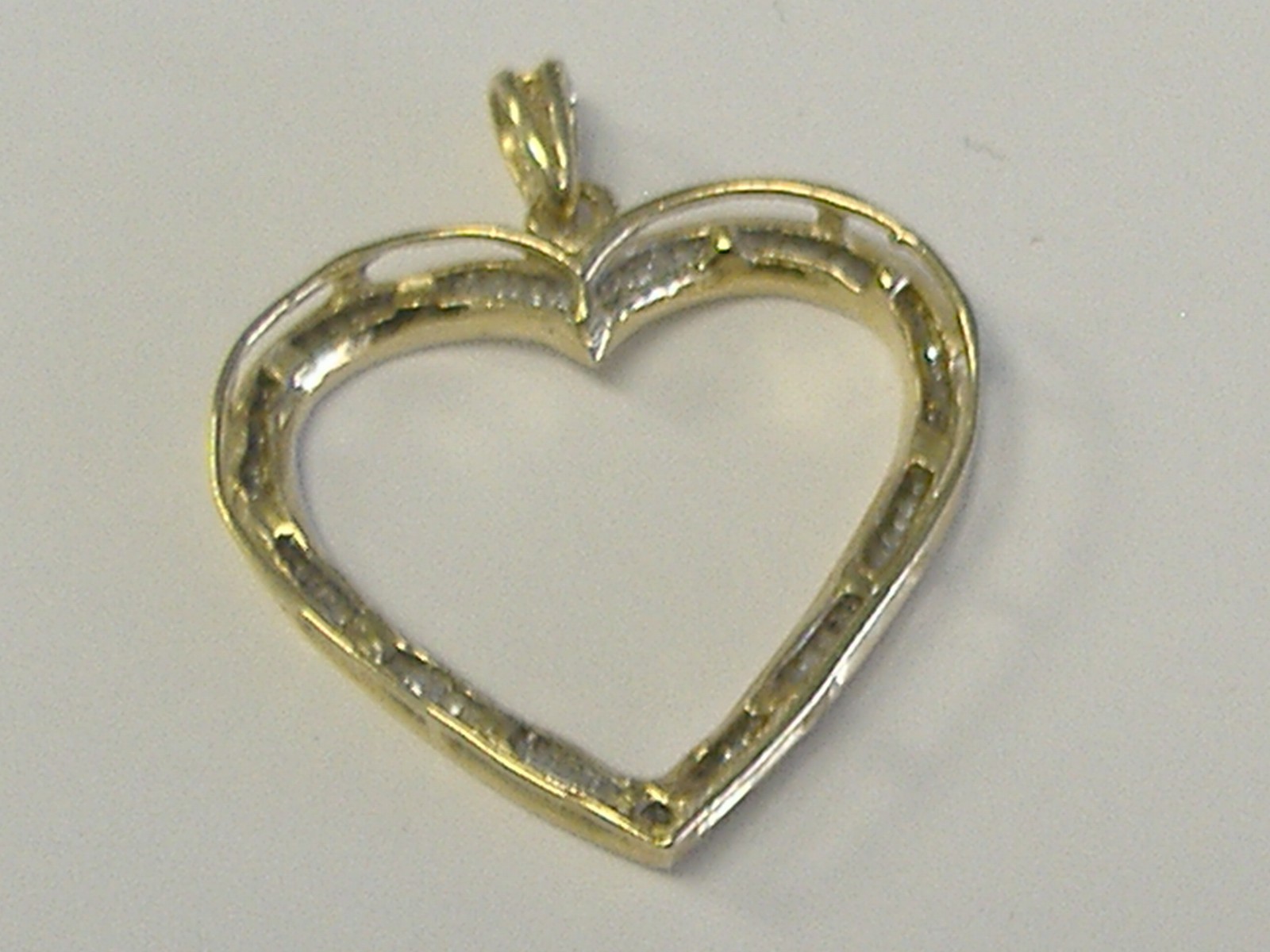 10K SOLID GOLD DIAMOND HEART BAGUETTES PENDANT APPROX. 1 CT TW. SIZE 23MM X 27MM
