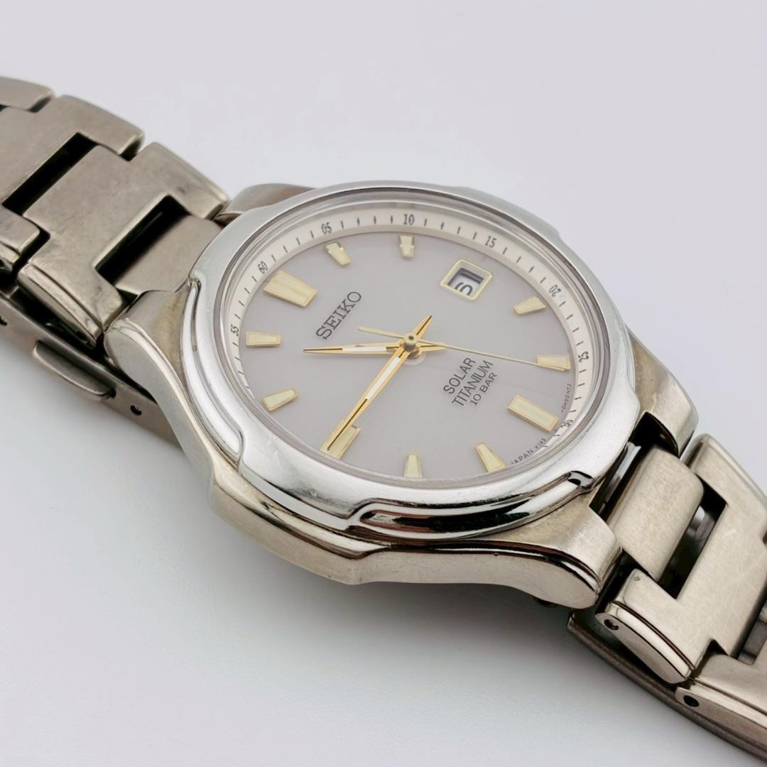 SEIKO Men’s Watch, Date Display, Original Strap, Solar Powered, Titanium