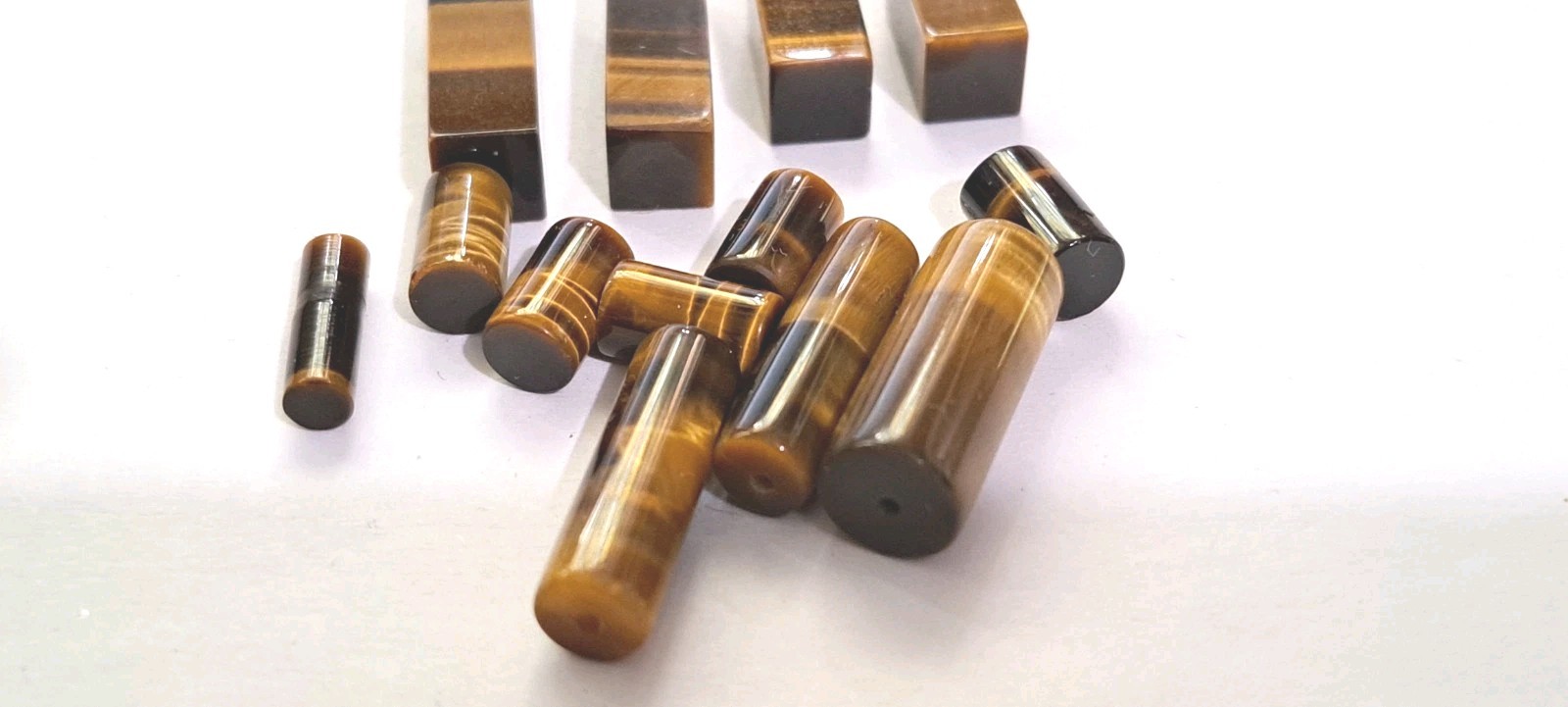 Lot of Tiger Eye Tube Stones As Pictured Nice Stones
