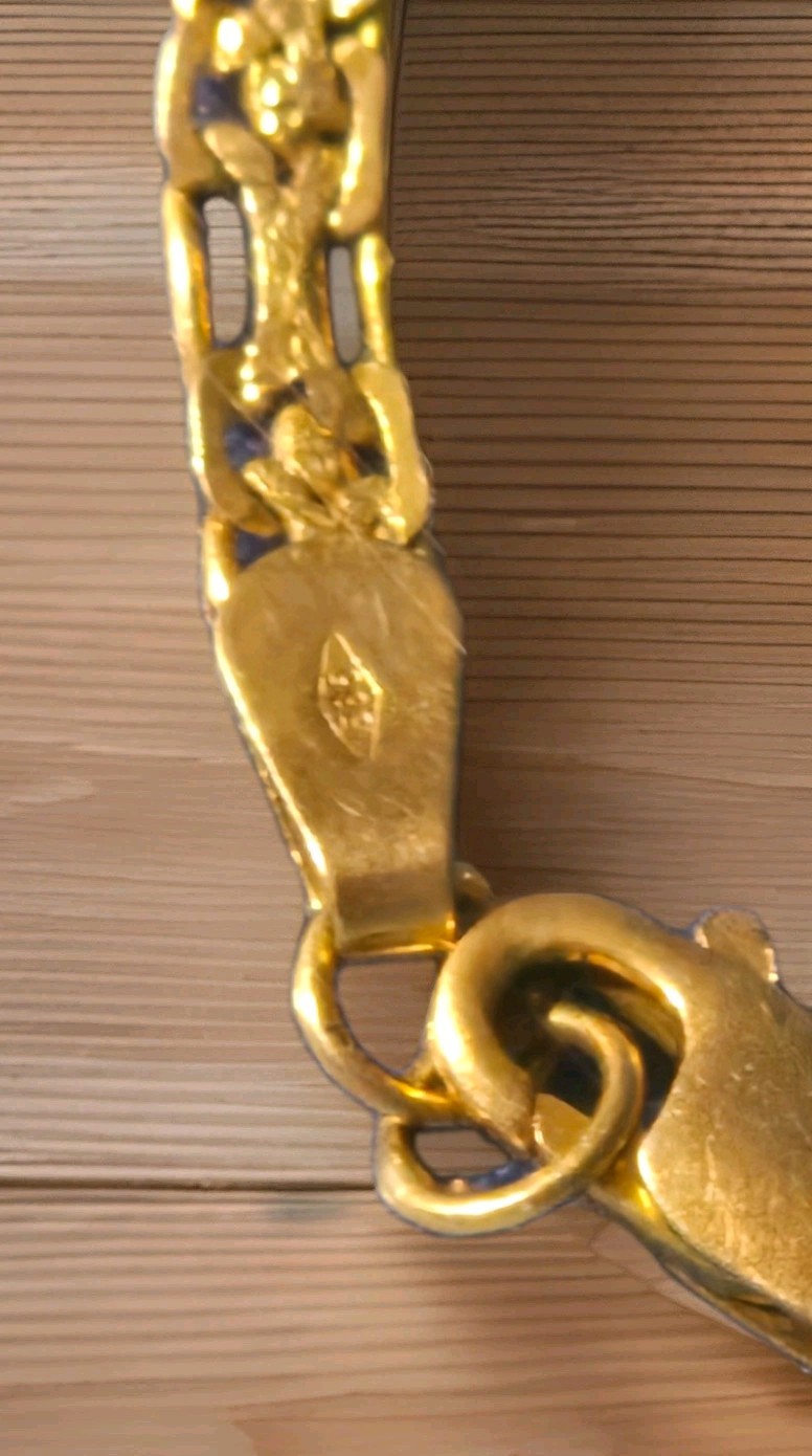 a vintage 14k Italian yellow gold figaro link bracelet 585