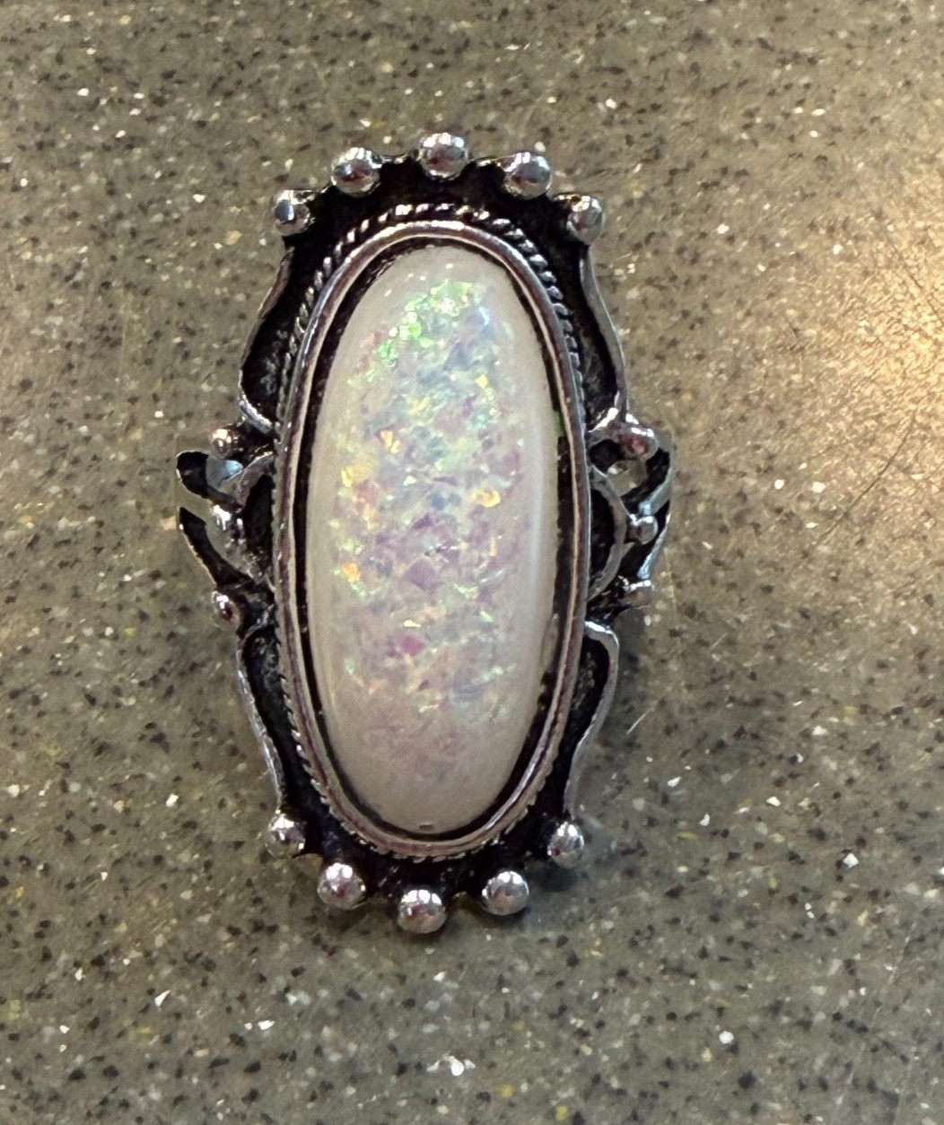 Long Faux White Opal White Resin Gemstone Steel Alloy Ring, Size Unknown, 1.25″