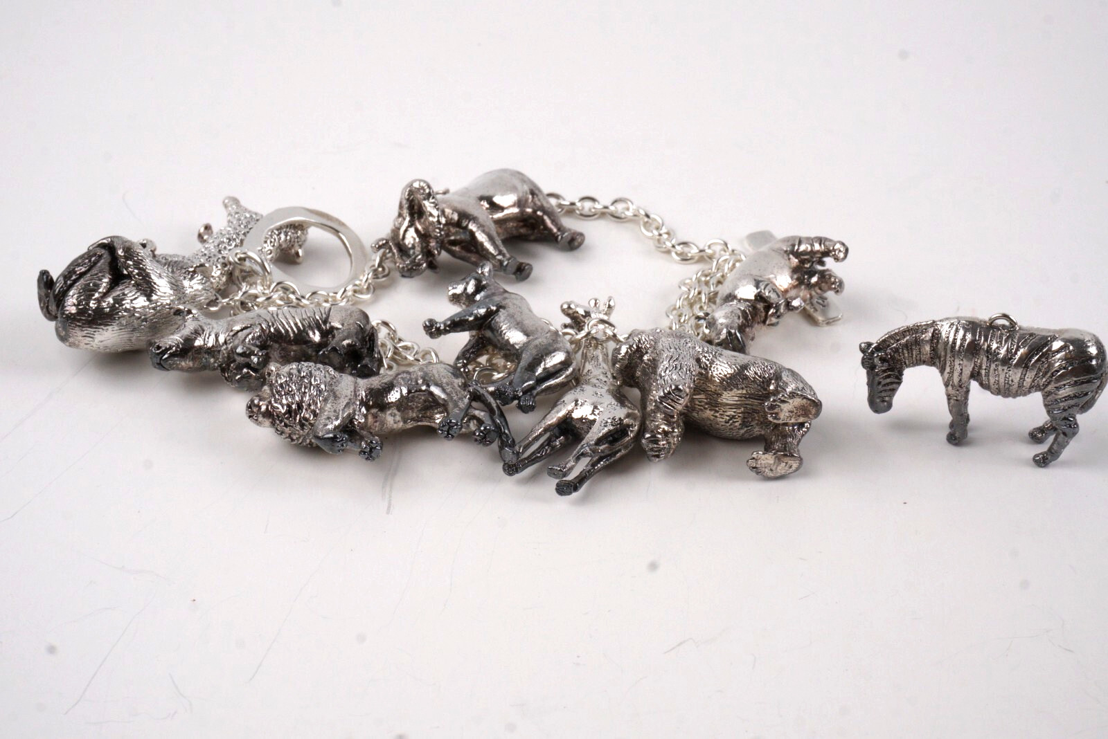 Susan Cummings Endangered Species African Animal Sterling Silver CharmBracelet
