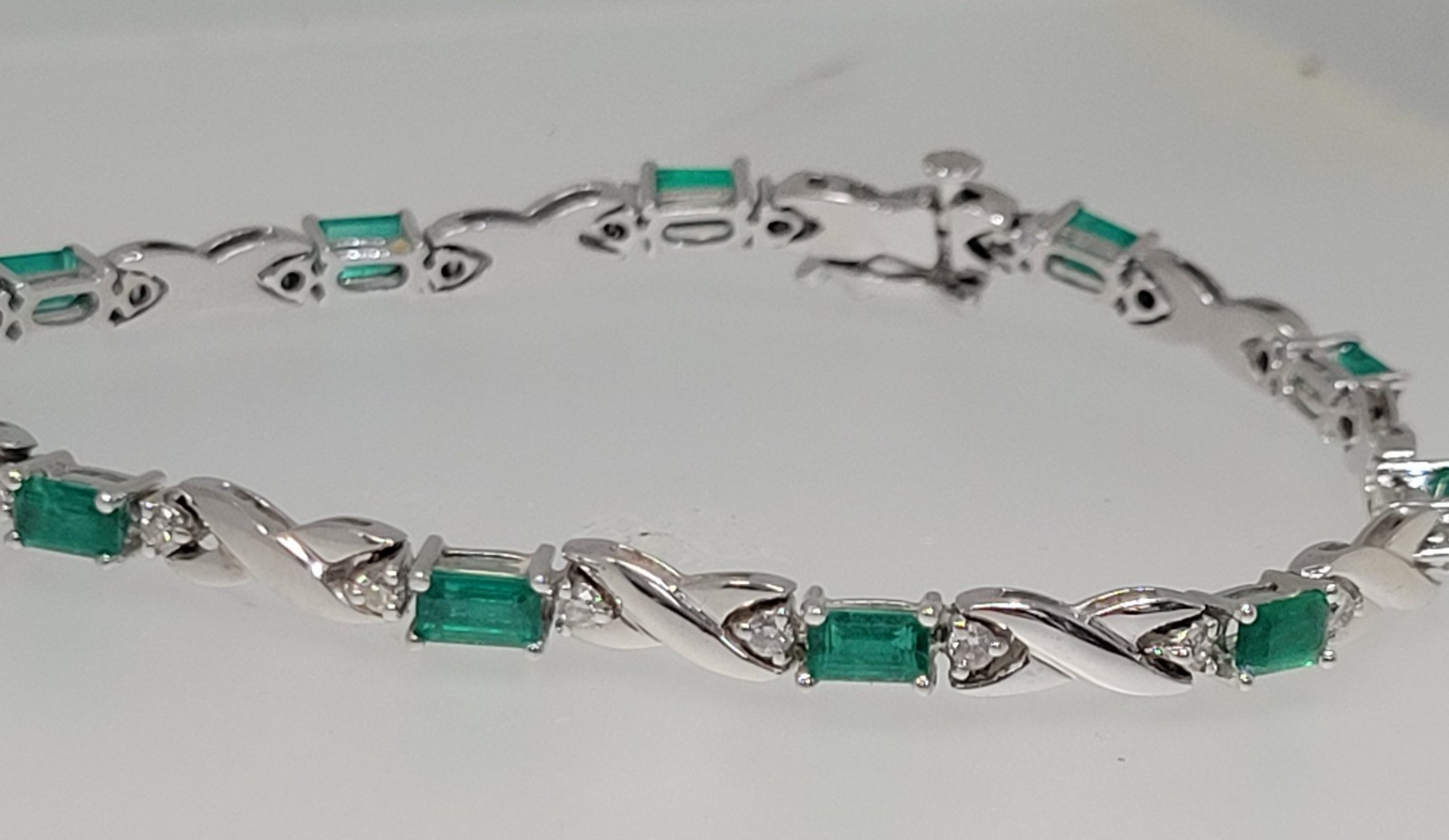 18k White Gold 3.3 cttw Gorgeous Emeralds and .63 cttw Diamond Bracelet