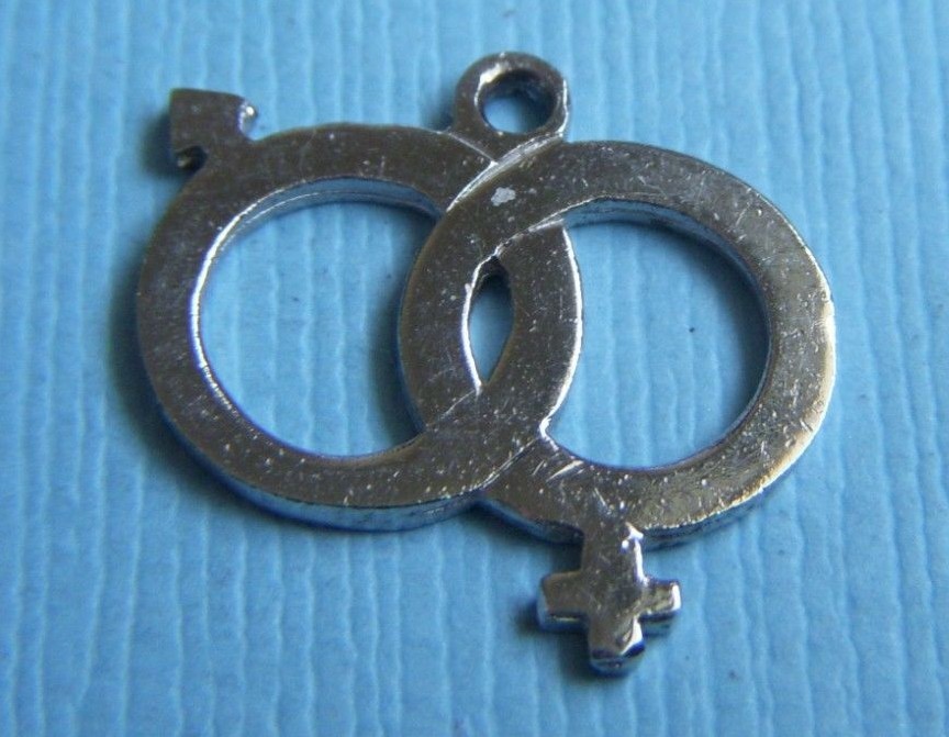 Vintage interlocking male and female symbols sterling charm