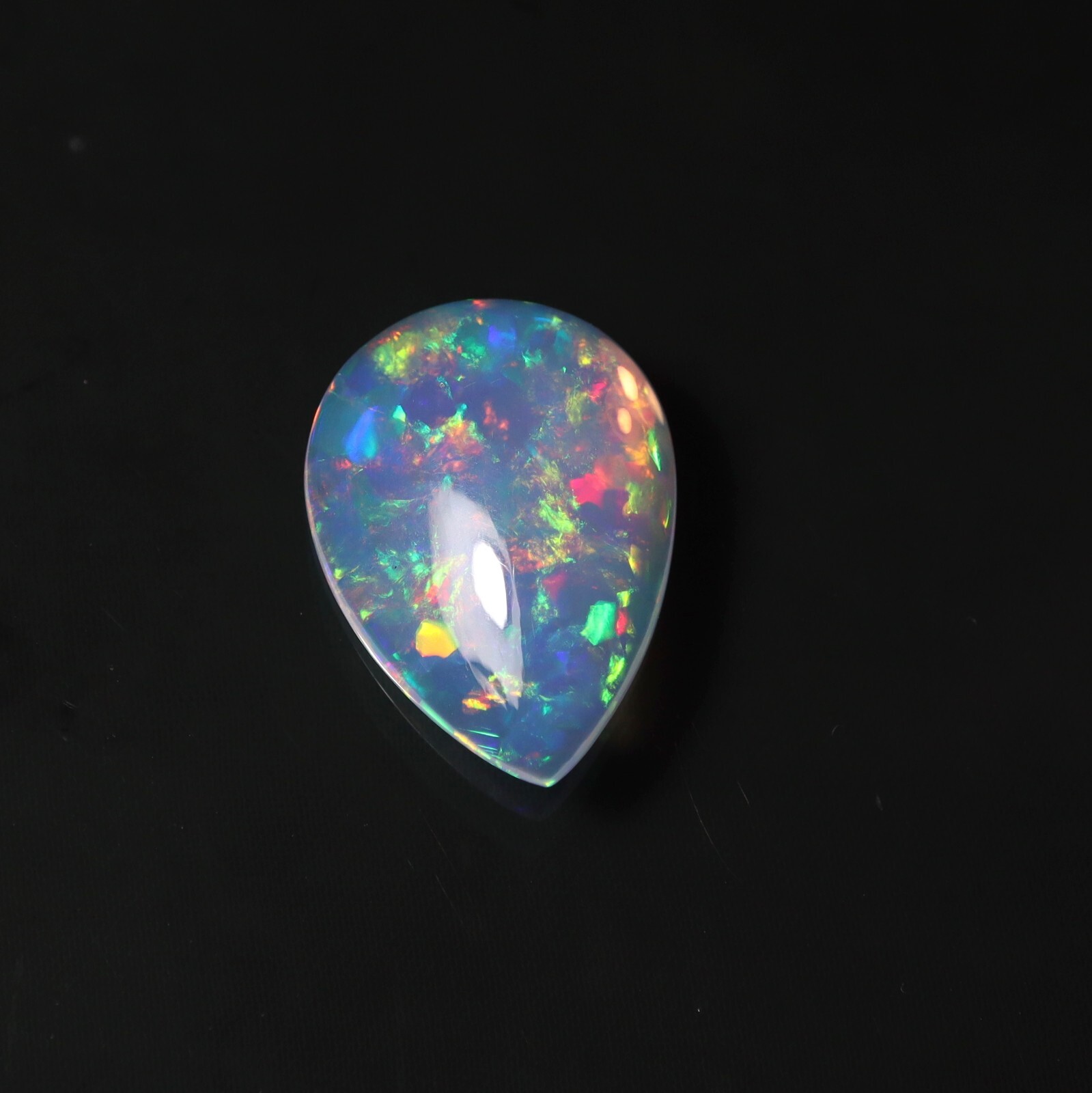 9 Carat 21.9×15.9 MM Natural AAAA Rainbow Fire Ethiopian Welo Opal Pear Shape