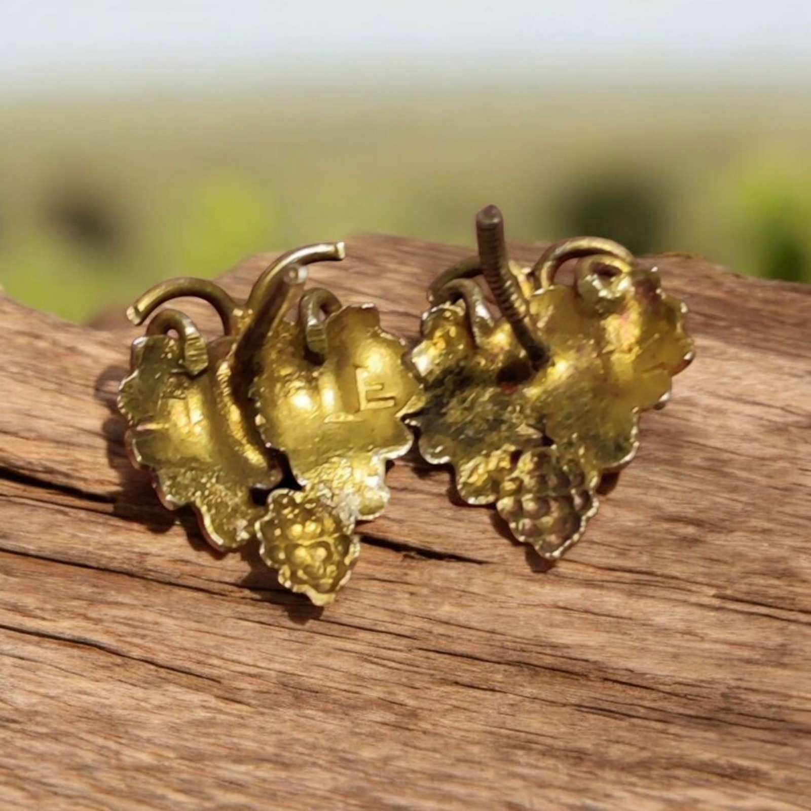 Landstrom’s Tri-Color Black Hills Gold, Grape, Leaf Stud Earrings, Sliver, Steel
