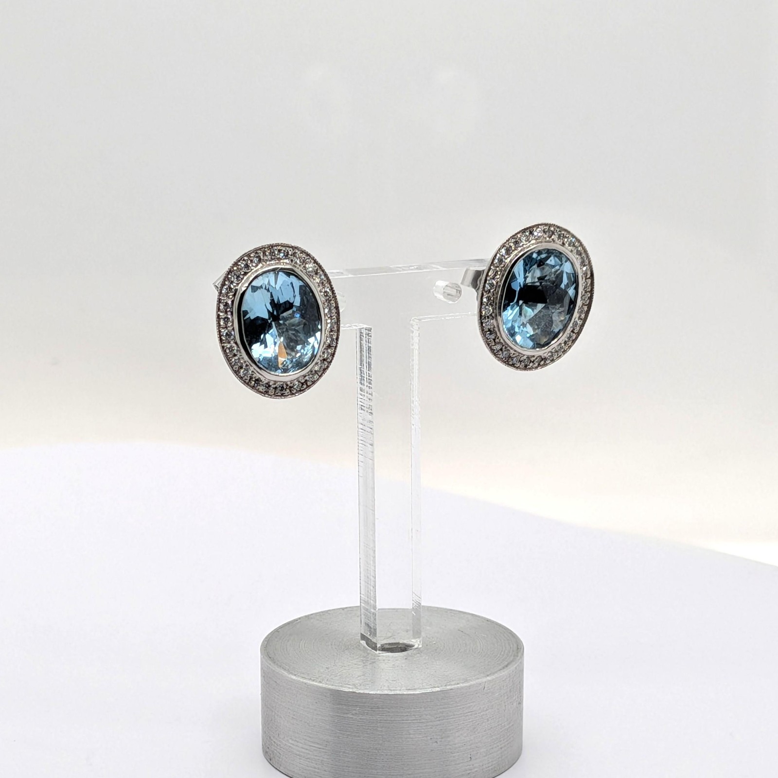 Aquamarine Stud Earrings with a Diamond Halo in 14k White Gold