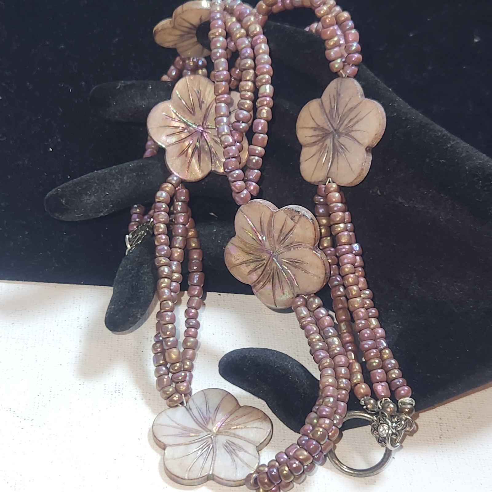 Iridescent Mauve Multi Strand Seed Bead Necklace Carved Shell Flower Toggle 21in